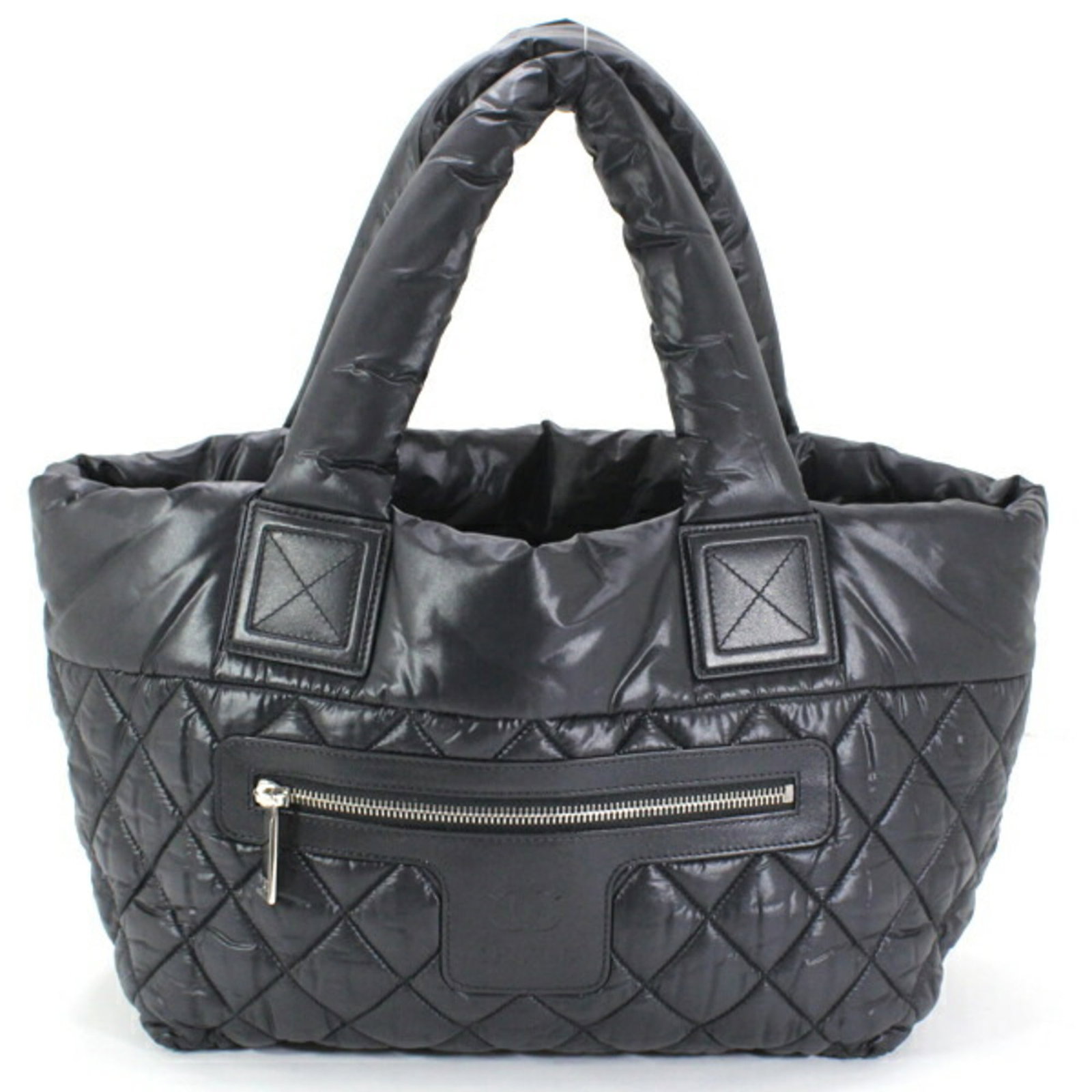 Nylon Chanel Handbag Tote: Nylon Chanel Handbag Tote Nylon Chanel Handbag Tote in Black and Bordeaux Colors. This stylish tote bag features a durable nylon material, measuring 24cm x 42cm x 15cm, making it a versatile