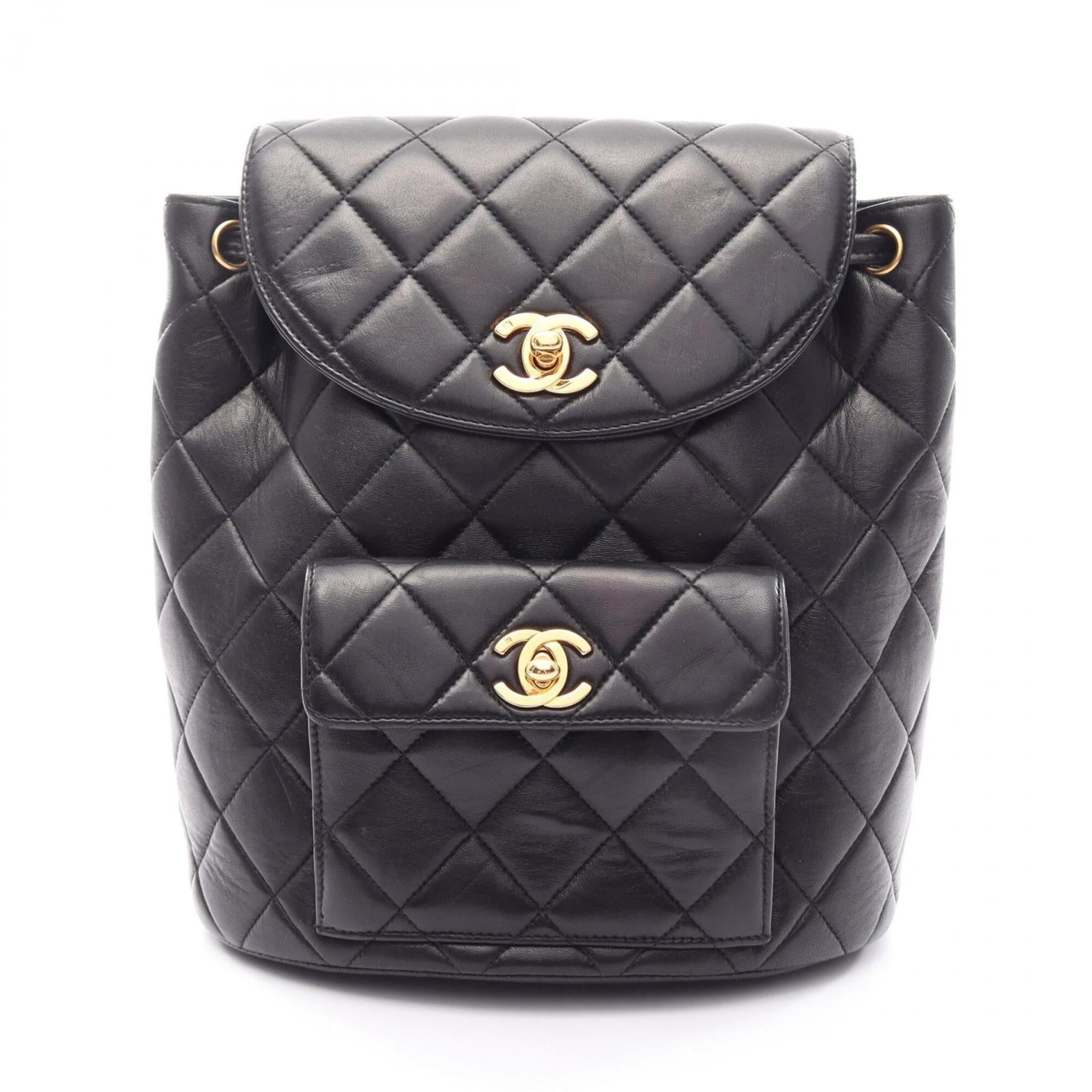 Chanel leather backpack: Chanel leather backpack Chanel's iconic leather backpack boasts sleek, all-black lambskin construction and gold-toned hardware for a sophisticated touch. Measuring 24cm x 21cm x 9.5cm, this compact ba