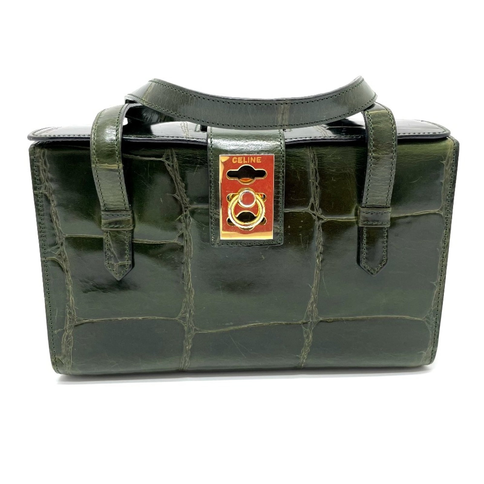 Handbag Celine Leather: Handbag Celine Leather This Celine leather handbag boasts a striking green color and measures 16cm x24cm x11.5cm, with a 17.7inch handle that adds to its stylish silhouette. The bag's base width is