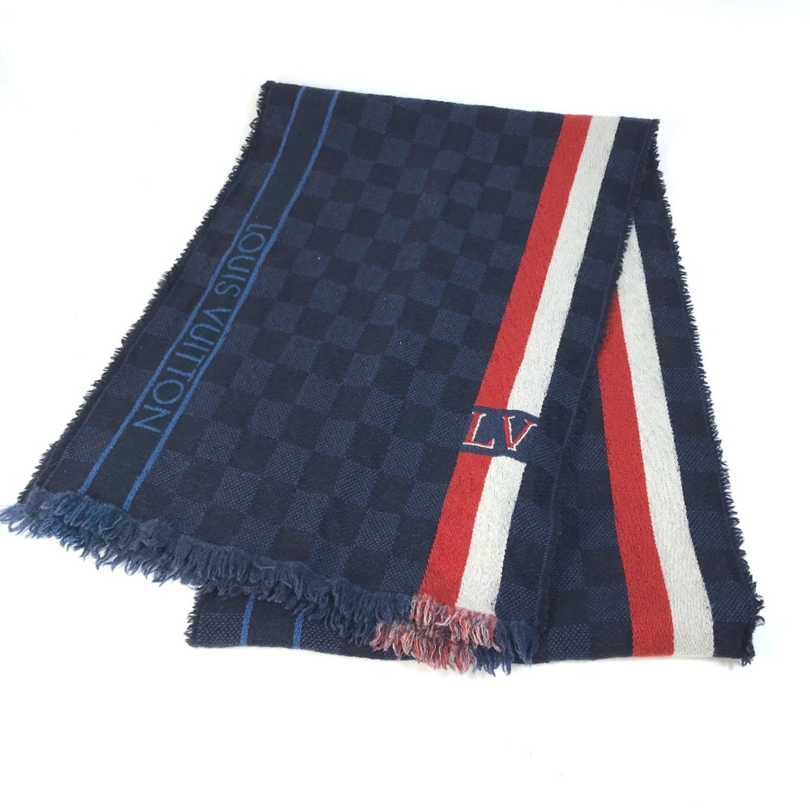 Stole wool by Louis Vuitton: Stole wool by Louis Vuitton Stole wool by Louis Vuitton, with its navy color and distinctive design. This unique piece measures W12.4 x H70.1inch / W31.5cm x H178cm and features a serial number