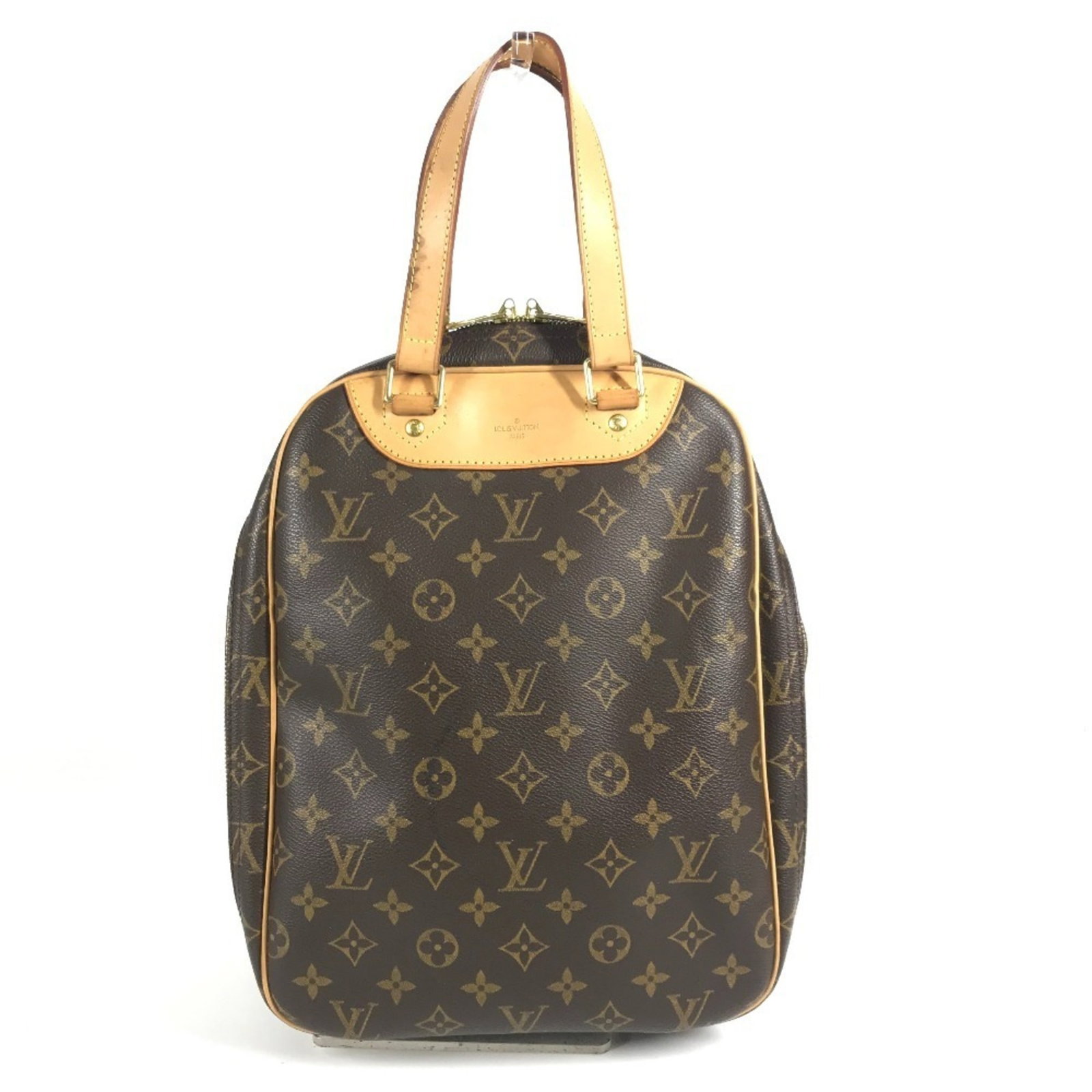 Handbag tote bag monogram Louis Vuitton: Handbag tote bag monogram Louis Vuitton Monogrammed with distinctive Louis Vuitton design, this brown tote bag boasts the iconic monogram pattern. Made from high-quality materials, its classic style
