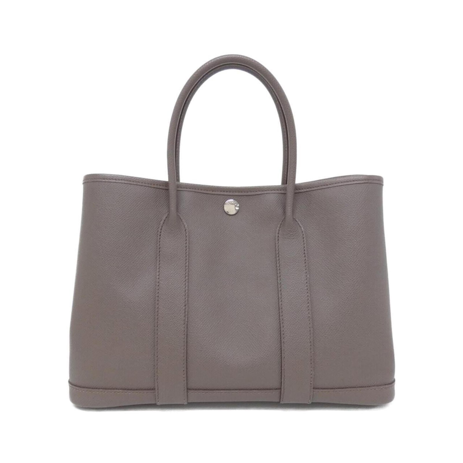 Epsom Leather Handbag Hermes: Epsom Leather Handbag Hermes Epsom leather handbags from Hermes are known for their exceptional craftsmanship and durability. This Etain-colored bag features silver hardware, making it a stylish acces