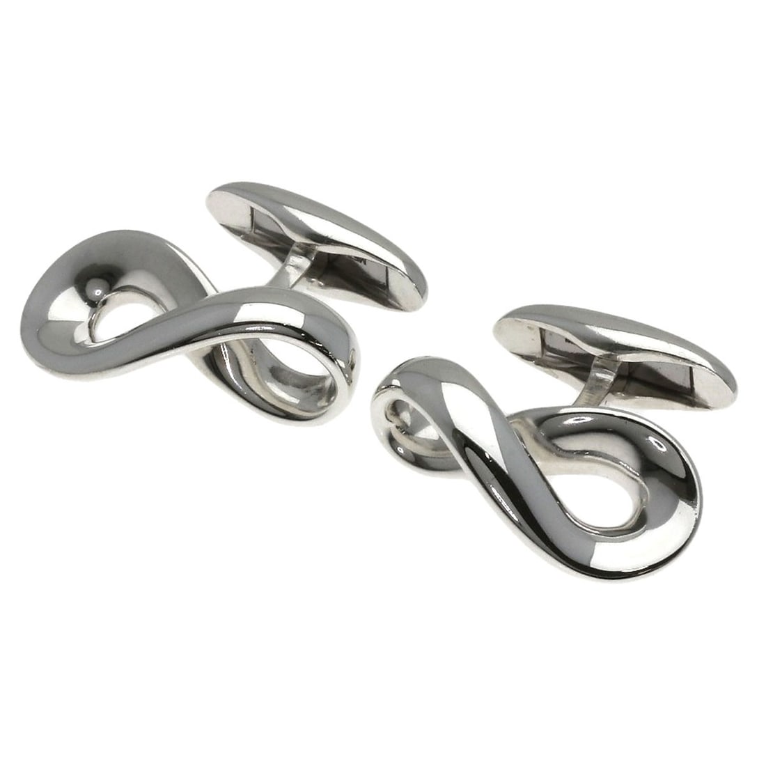 Infinity cufflinks of silver by Georg Jensen.: Infinity cufflinks of silver by Georg Jensen. Silver Infinity Cufflinks by Georg Jensen, crafted from high-quality silver material. The sleek and modern design features an infinity symbol, adding a