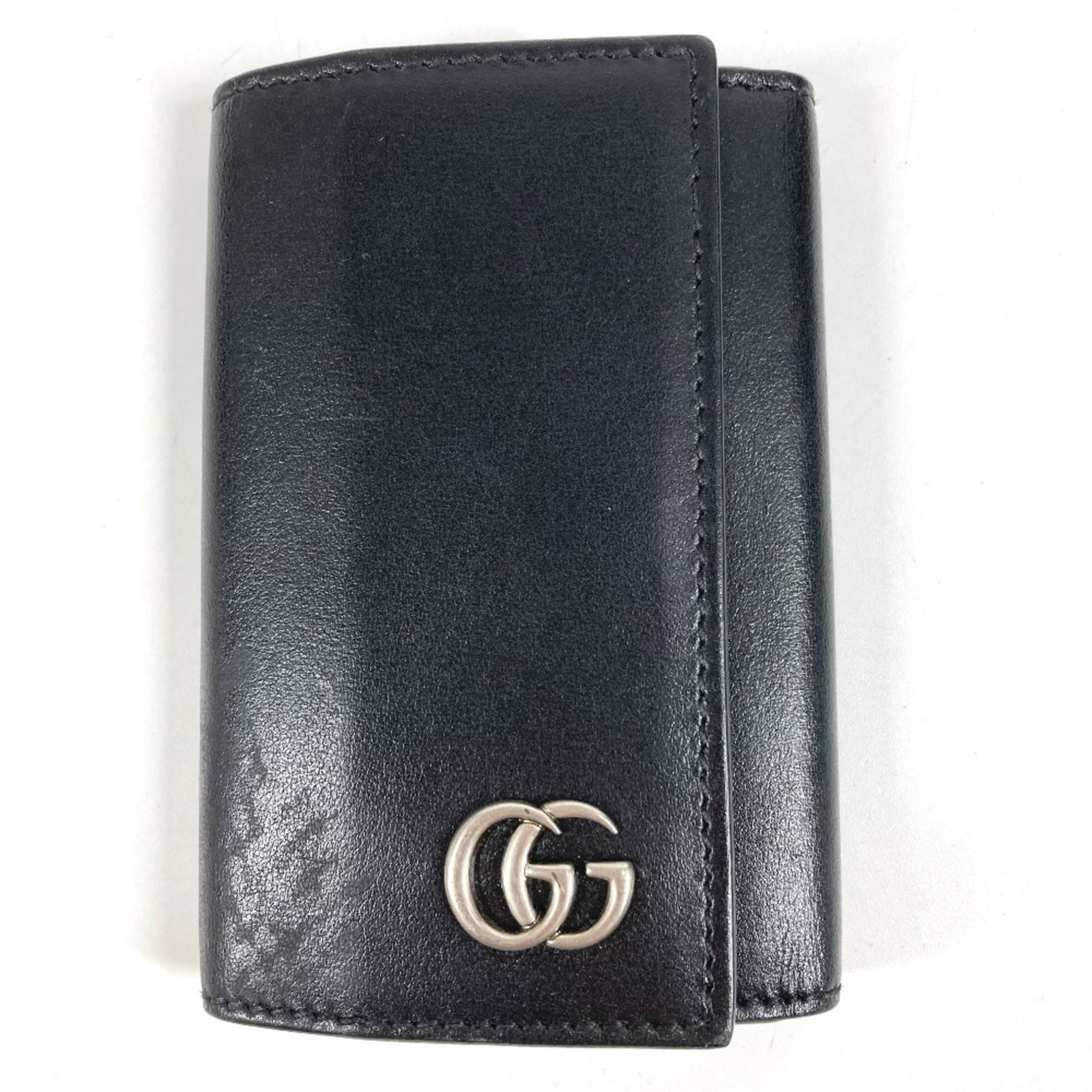 Keycase Leather by Gucci: Keycase Leather by Gucci Keycase Leather by Gucci - A sleek and sophisticated accessory, this black leather keycase boasts six spacious key hooks, perfect for keeping your daily essentials organized. 