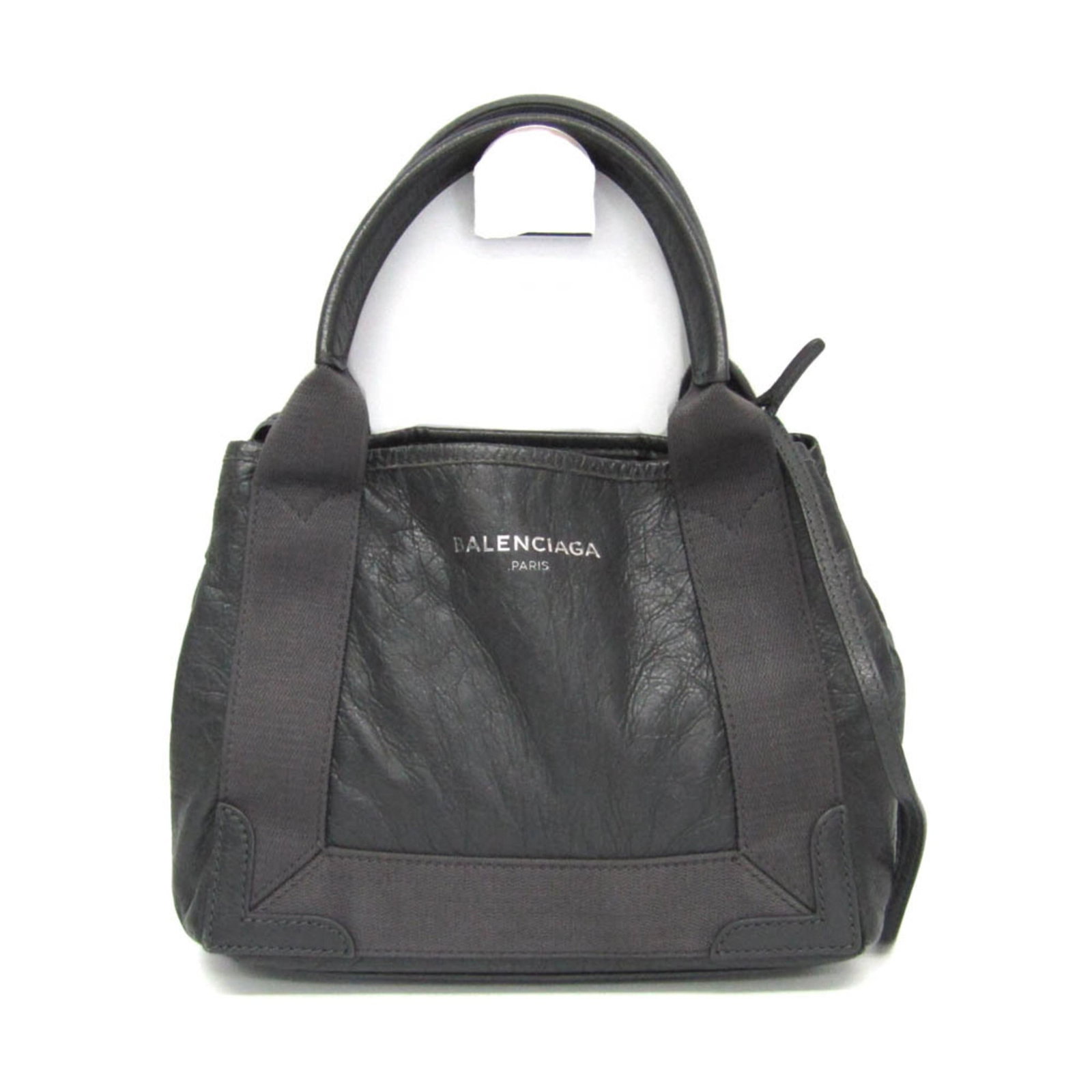 Balenciaga Handbag Shoulder Bag Leather: Balenciaga Handbag Shoulder Bag Leather Navy Cabas shoulder bag from Balenciaga, crafted in high-quality Italian leather with a sleek dark gray color and silver hardware. This versatile bag features