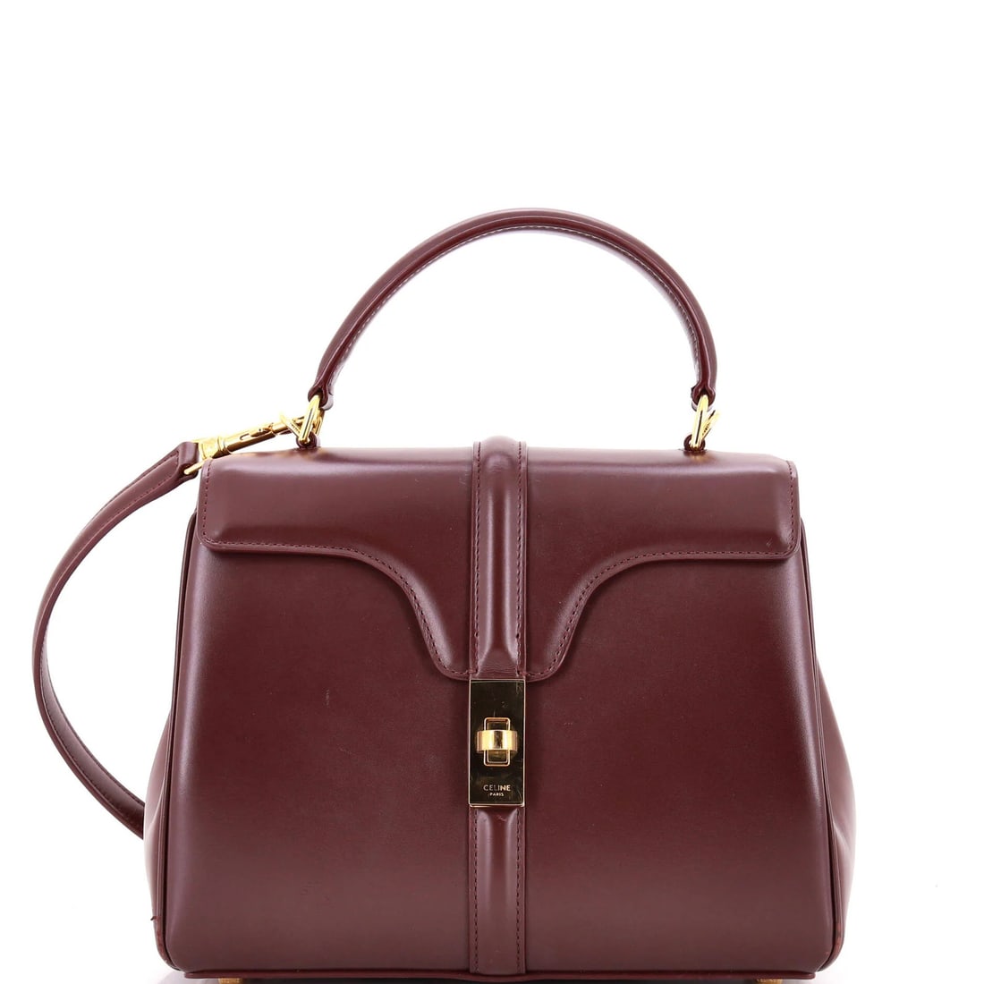 Calfskin Small Smooth Top Handle Bag 16 by Celine: Calfskin Small Smooth Top Handle Bag 16 by Celine Burgundy Calfskin Small Top Handle Bag by Celine features a smooth, high-quality leather exterior with heavy edge wear and minor scuffs. The bag's