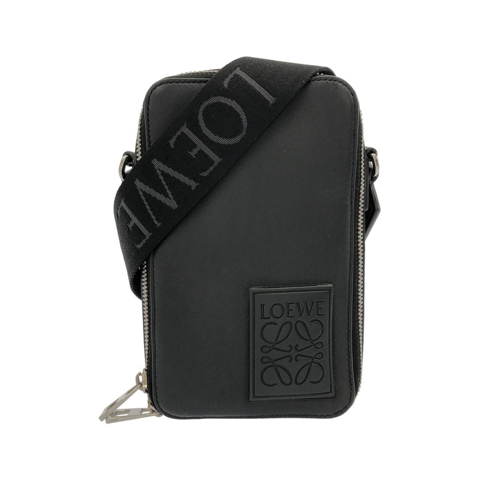 Leather shoulder bag by Loewe: Leather shoulder bag by Loewe Loewe's sleek leather shoulder bag boasts a sophisticated black finish, measuring 18cm x 11.5cm x 3.5cm in size. Crafted from high-quality leather, this stylish