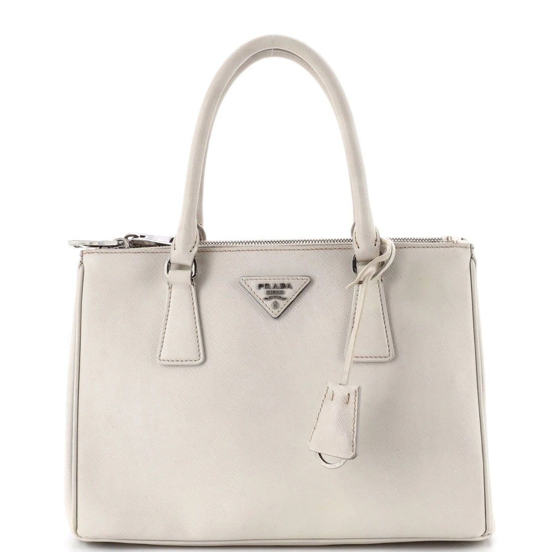 Prada Galleria Double Zip Tote Saffiano Leather Small: Prada Galleria Double Zip Tote Saffiano Leather Small White Saffiano Leather Prada Galleria Double Zip Tote in Small Size, featuring exterior scuffs and edge wear. This outlet condition tote boasts a