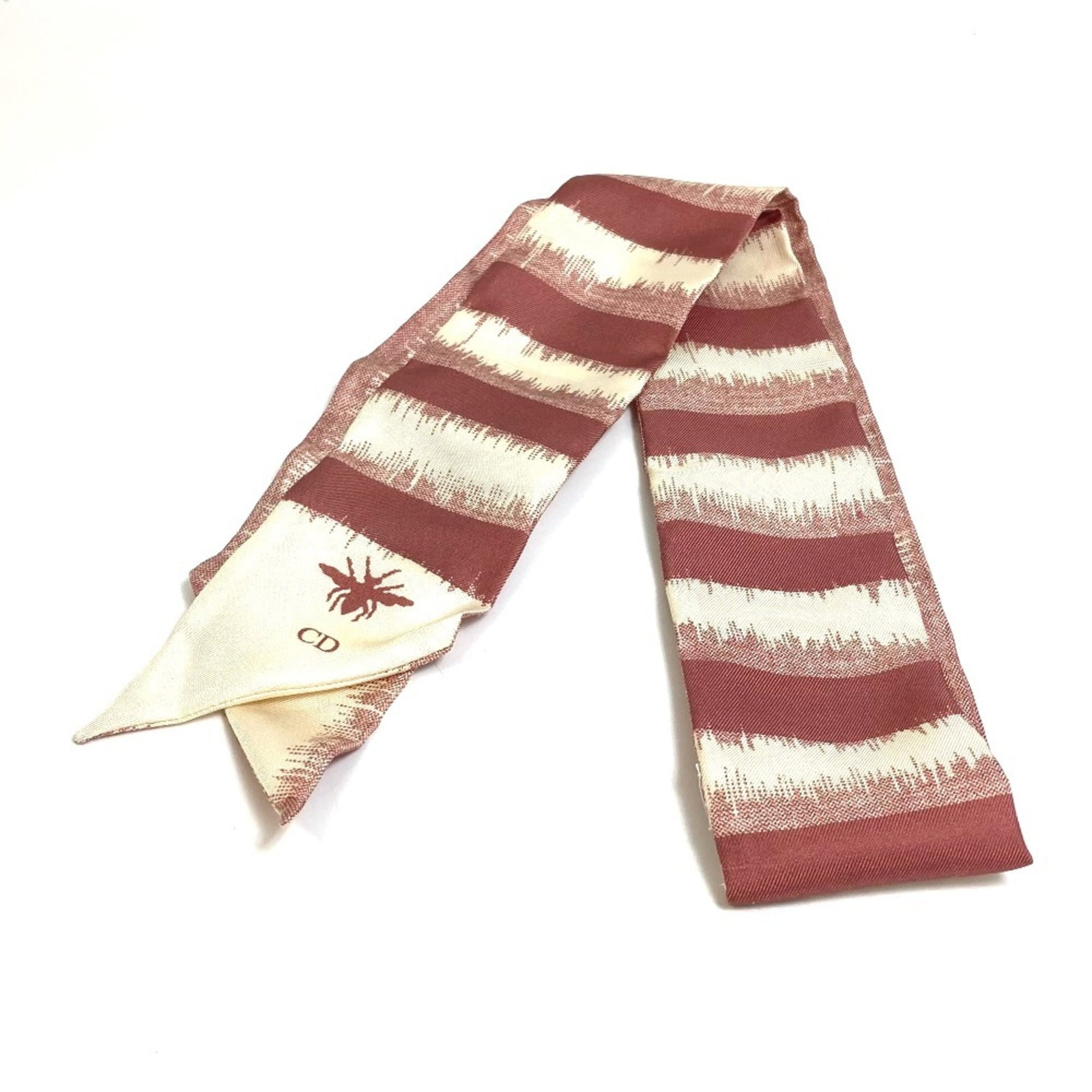 Silk by Christian Dior Scarf: Silk by Christian Dior Scarf Silk by Christian Dior Scarf in Beige and Pink, measuring 6cm x 96cm. This luxurious silk scarf features a beautiful combination of beige and pink hues, adding a touch of