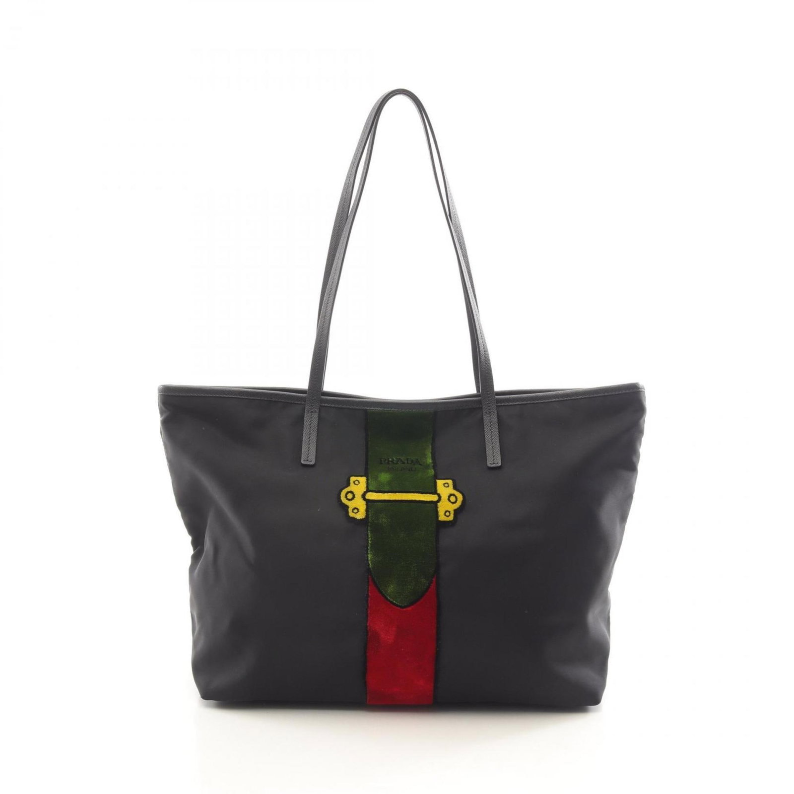 Nylon leather Prada tote bag: Nylon leather Prada tote bag Saffiano leather construction and nylon accents give this Prada tote bag its distinctive look. The black color with multi-color details adds visual interest, while the com