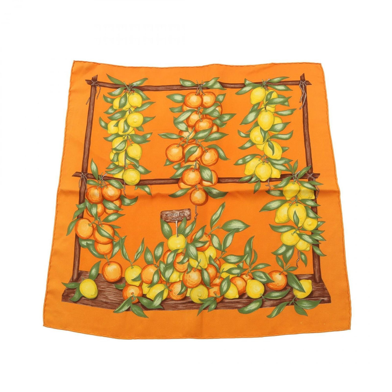 Hermes Silk Scarf: Hermes Silk Scarf Silk in multi-colors, orange and yellow hues creates a vibrant pattern on this 42cm x 42cm scarf from the renowned French fashion house Hermes. Made from high-quality silk, its
