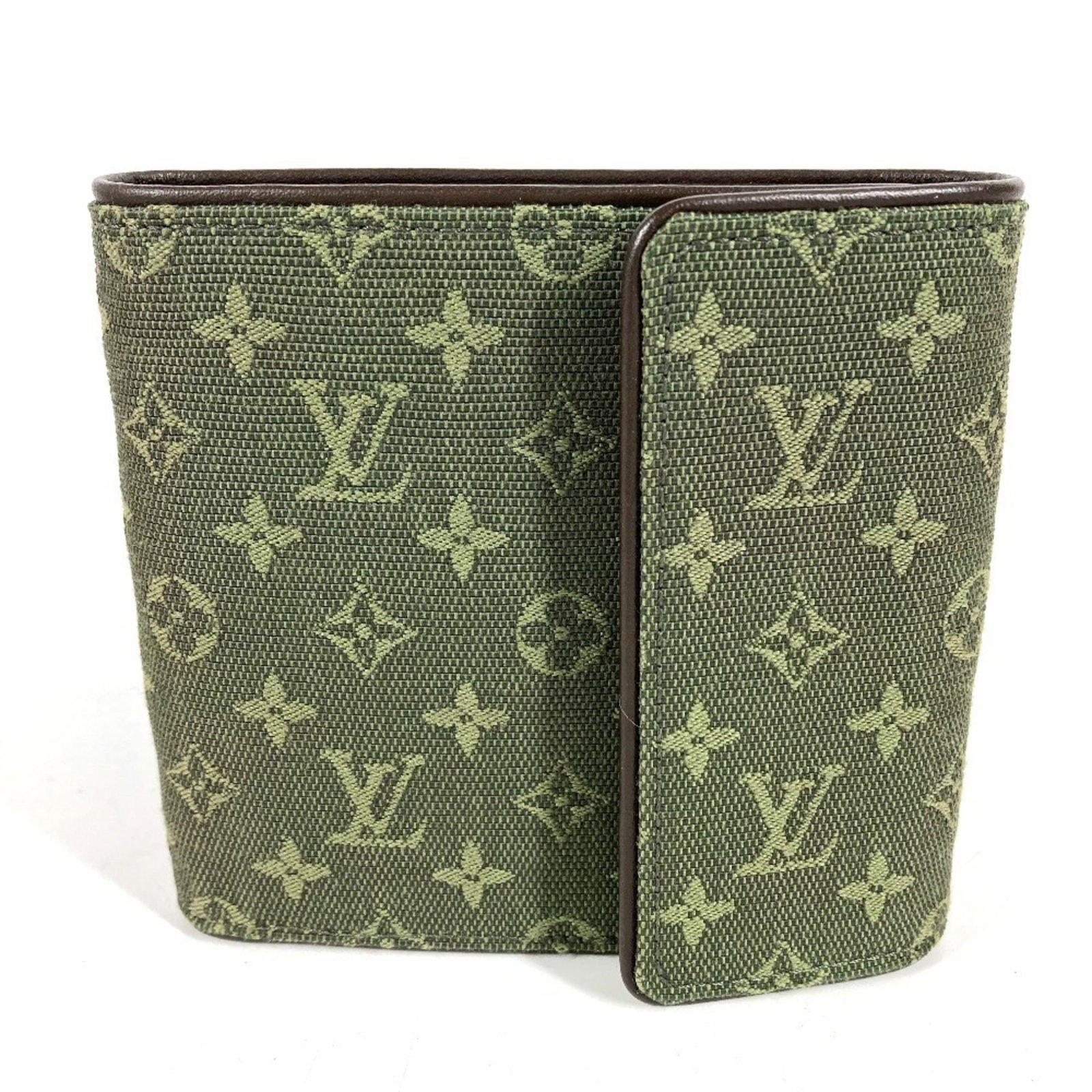 Louis Vuitton Wallet (Tri-Fold) Monogram Mini Canvas: Louis Vuitton Wallet (Tri-Fold) Monogram Mini Canvas Monogram Mini Canvas, the iconic Louis Vuitton design takes center stage in this stylish tri-fold wallet. Crafted from high-quality canvas with a