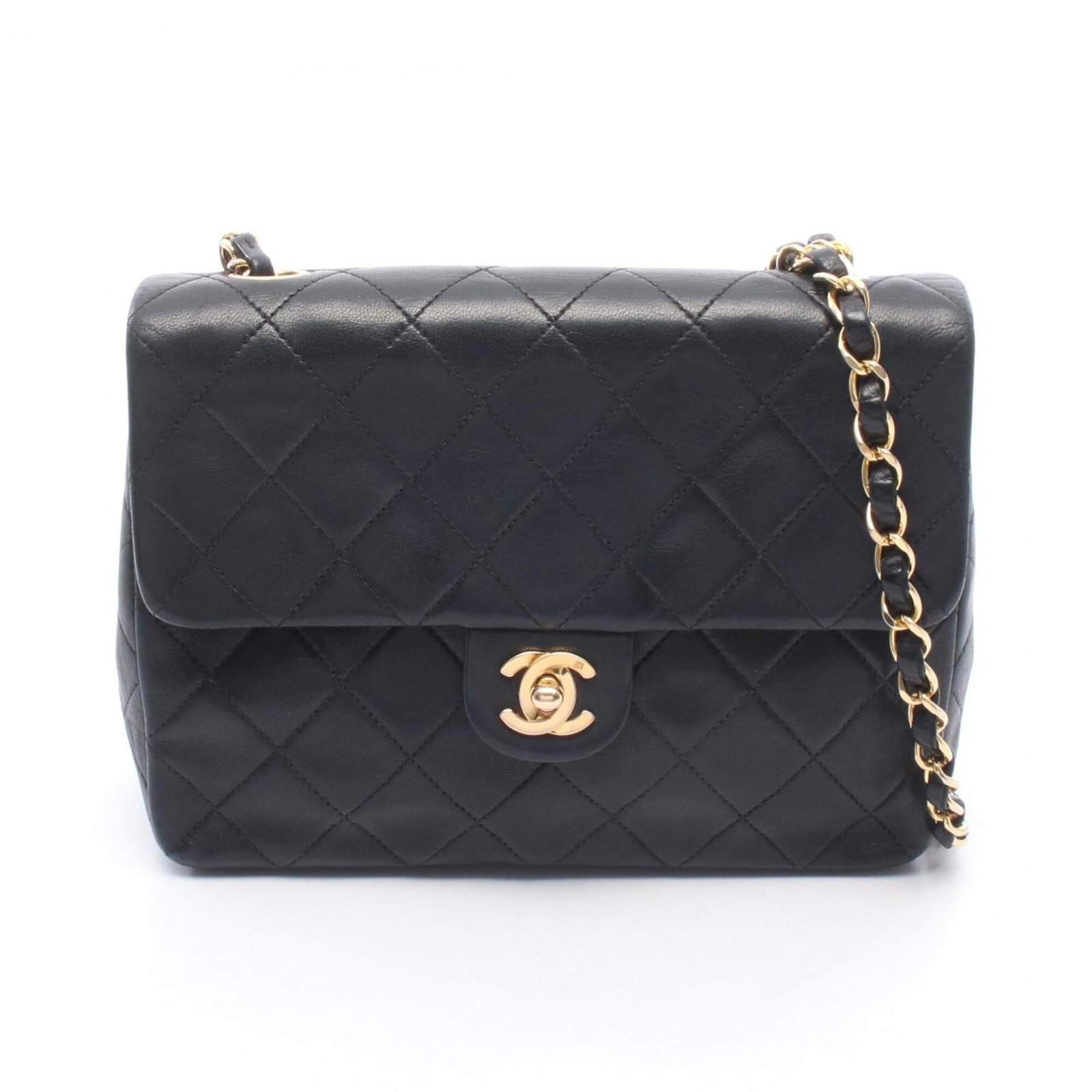 Chanel Handbag Shoulder Bag Leather: Chanel Handbag Shoulder Bag Leather Black lambskin leather Chanel shoulder bag with classic design, measuring 15cm x 20cm x 6cm. This stylish and timeless piece features high-quality leather construct