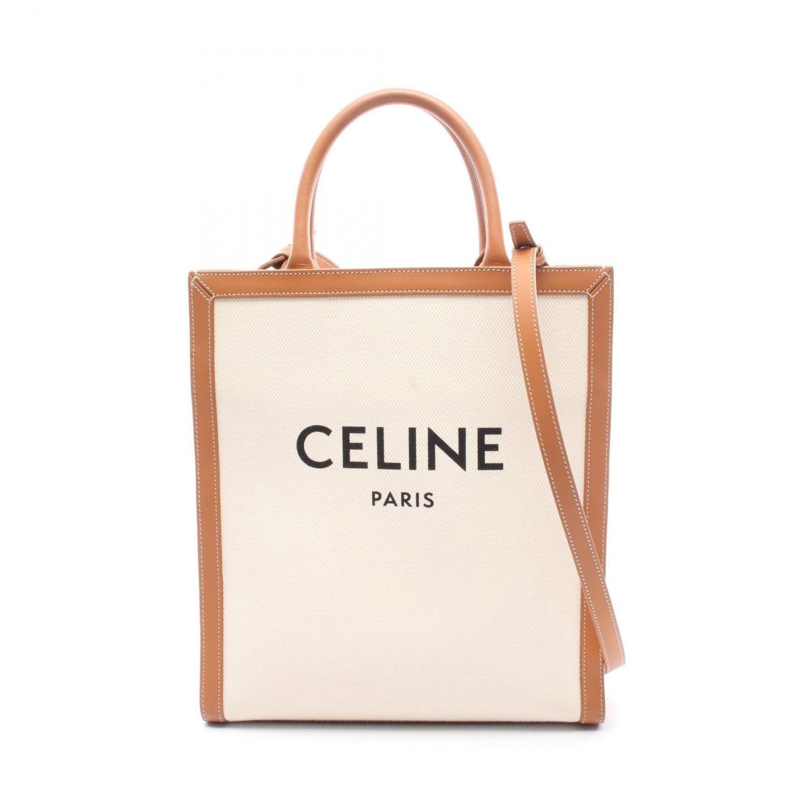 Canvas leather tote bag Celine: Canvas leather tote bag Celine Canvas leather tote bag from Celine, featuring a sturdy canvas body and high-quality leather accents in brown and ivory hues. The bag's classic design is complemented by