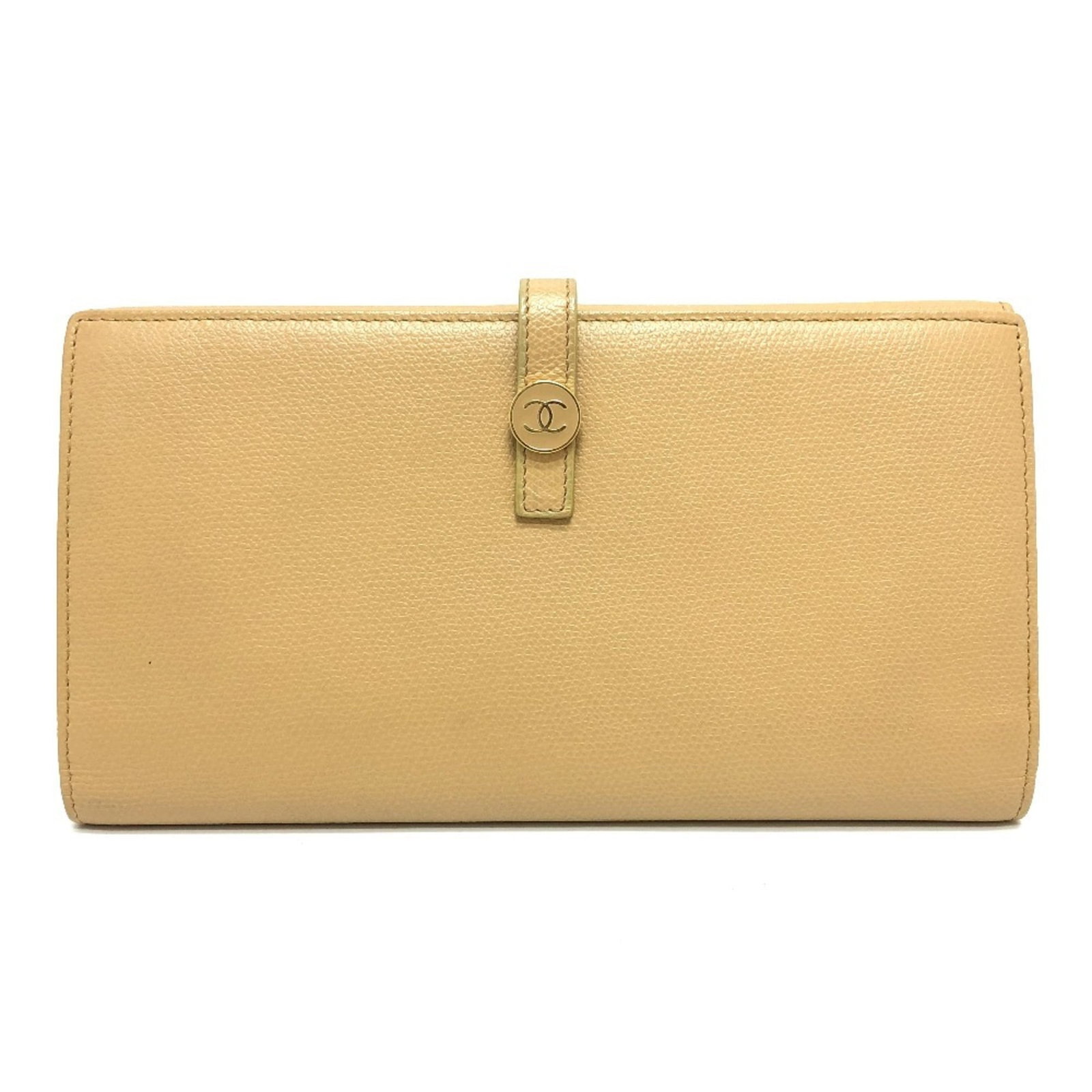 Chanel Long Wallet (Bi-Fold) Leather: Chanel Long Wallet (Bi-Fold) Leather Chanel's iconic bi-fold long wallet boasts a classic beige leather design, complete with a snap fastener closure and multiple slots for cards, bills, and coins.