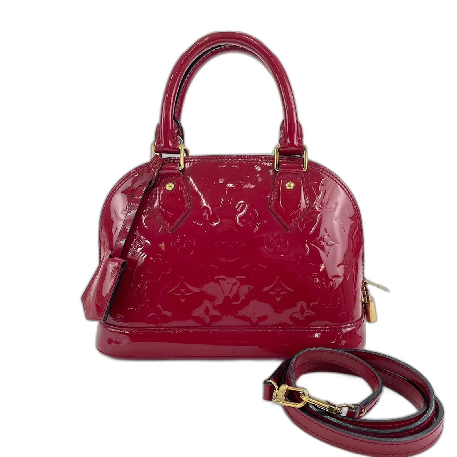 Louis Vuitton Handbag: Louis Vuitton Handbag Red Louis Vuitton Handbag, 17cm x 23cm x 11cm. This handbag features the iconic red color and classic design that has become synonymous with luxury. With its signature monogram