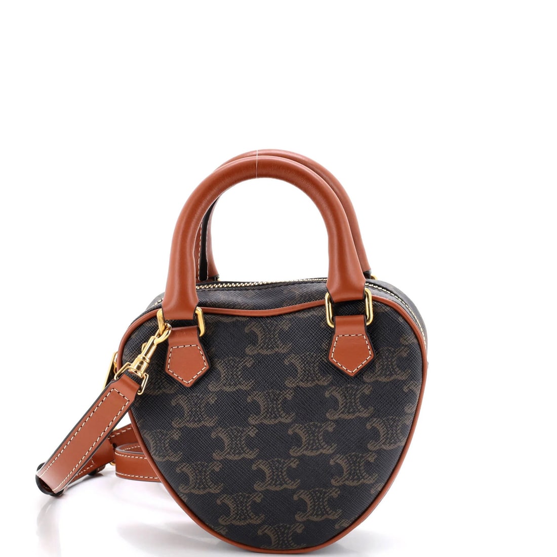Celine Heart Bag Triomphe Coated Canvas Medium: Celine Heart Bag Triomphe Coated Canvas Medium The Celine Heart Bag Triomphe Coated Canvas Medium boasts a stylish medium size with clean lines, measuring 5" in height, 5" in width, and 2" in depth. I
