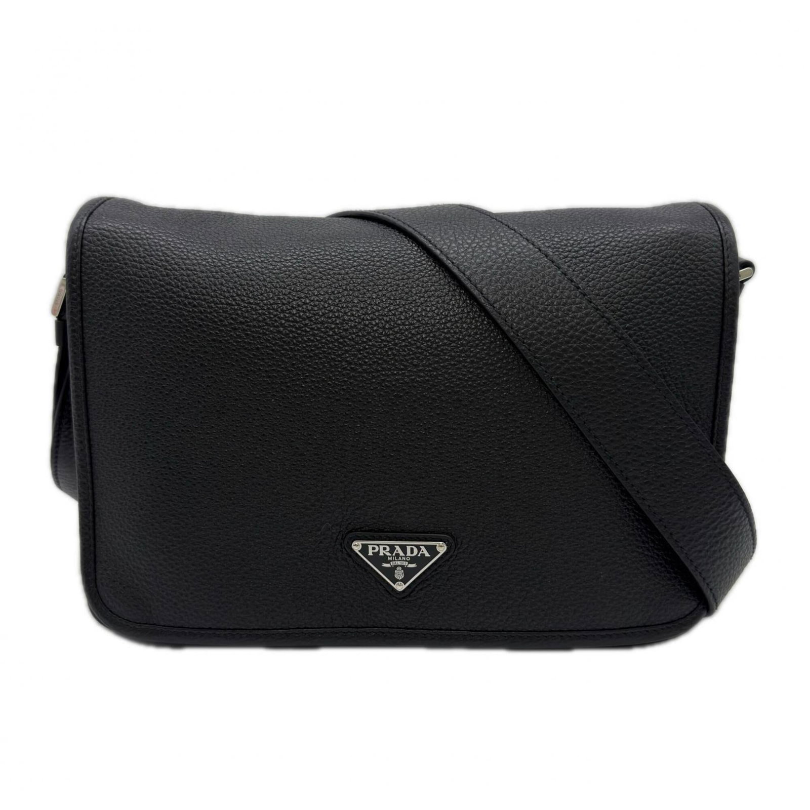 Shoulder Bag Leather by Prada: Shoulder Bag Leather by Prada The Prada Shoulder Bag is crafted from high-quality leather, specifically calfskin. This stylish bag features a sleek design with a magnetic closure and adjustable strap 