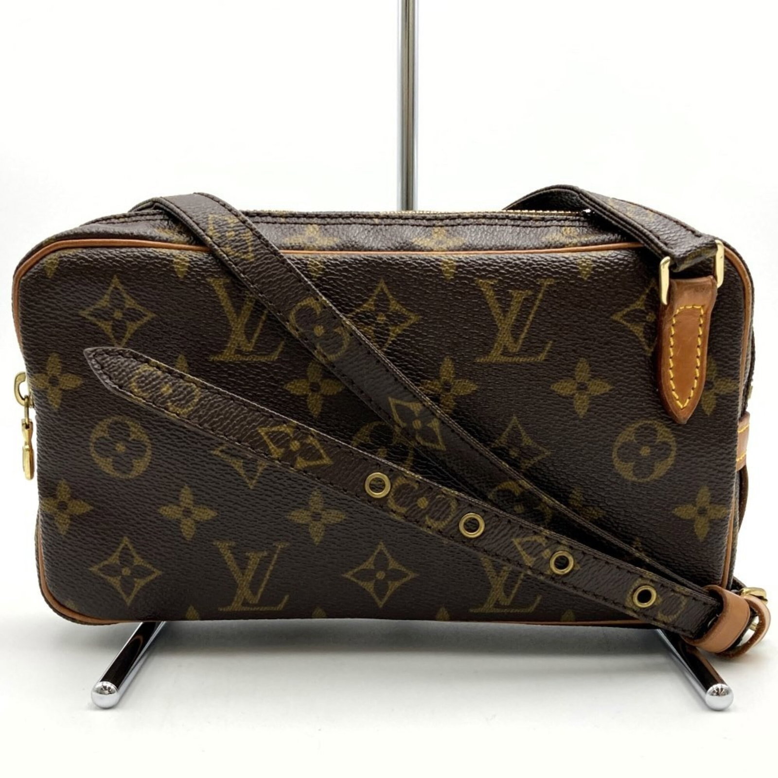Shoulder Bag Monogram By Louis Vuitton: Shoulder Bag Monogram By Louis Vuitton Brown Monogram Shoulder Bag by Louis Vuitton, featuring the iconic monogram pattern and a sturdy zipper closure. Measuring 12cm x 22cm x 4cm, this compact bag ha