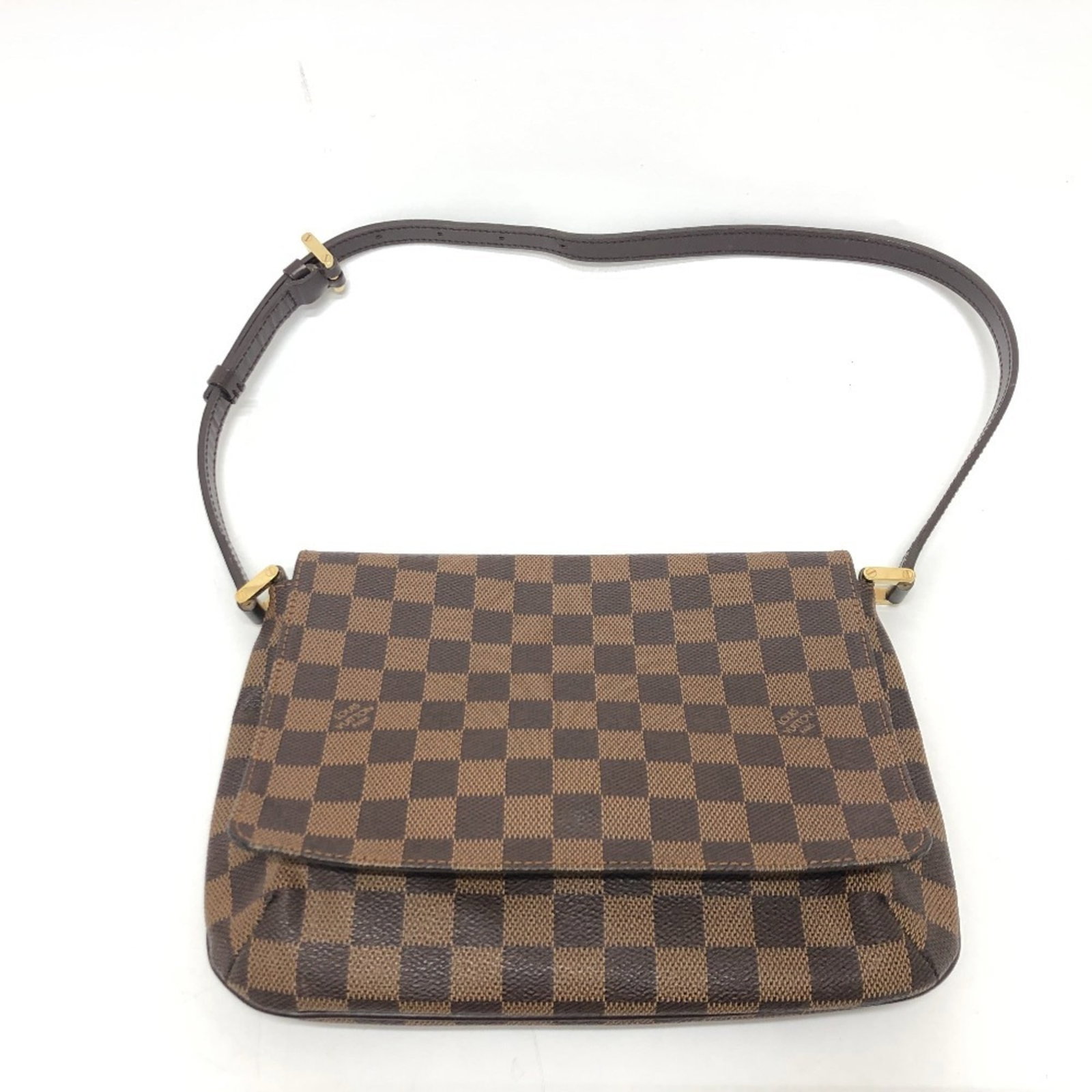 Damier canvas shoulder bag from Louis Vuitton: Damier canvas shoulder bag from Louis Vuitton Damier canvas shoulder bag from Louis Vuitton, featuring the iconic Ebene color. This classic design showcases the timeless appeal of Damier print on