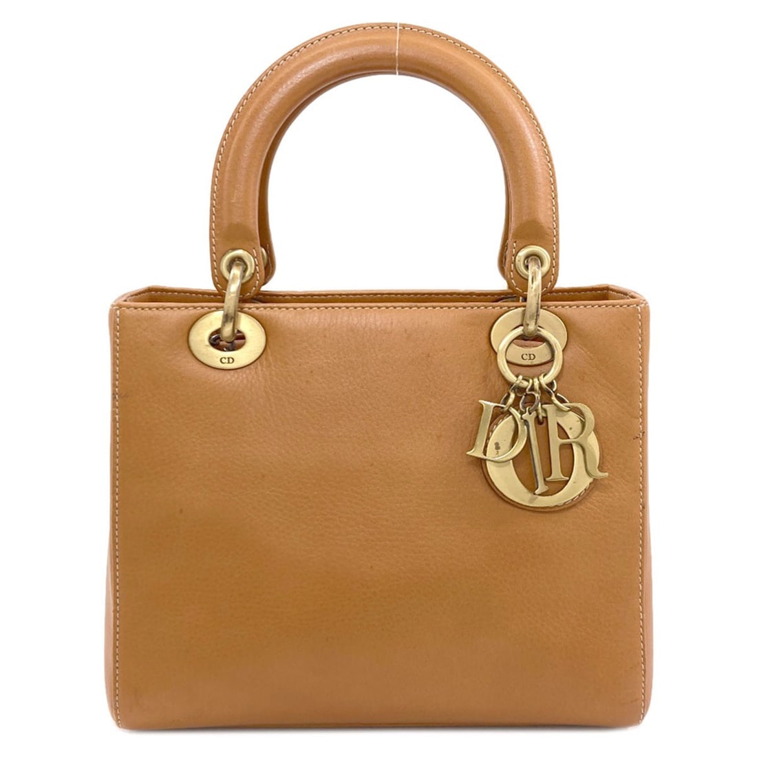 Calf Dior Handbag Christian: Calf Dior Handbag Christian The Calf Dior Handbag Christian boasts a rich, brown calf exterior that adds a touch of sophistication to any outfit. This stylish handbag features a classic design with