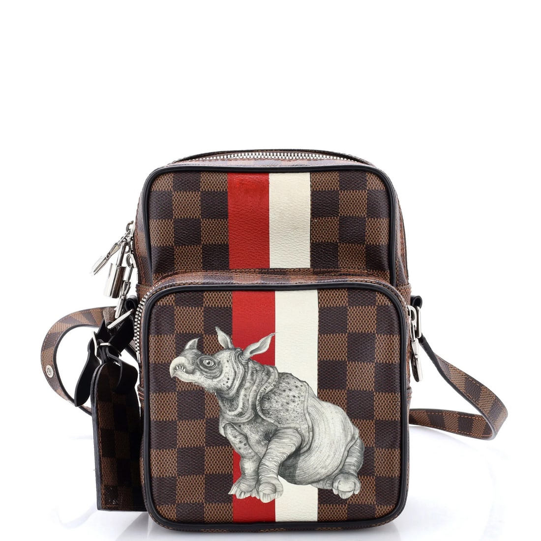Limited edition Damier bag by Chapman for Louis Vuitton: Limited edition Damier bag by Chapman for Louis Vuitton Brown canvas coated cross body bag with minor creases, featuring the iconic Damier pattern and silver hardware. Measuring 8" x 6" x 4", it has