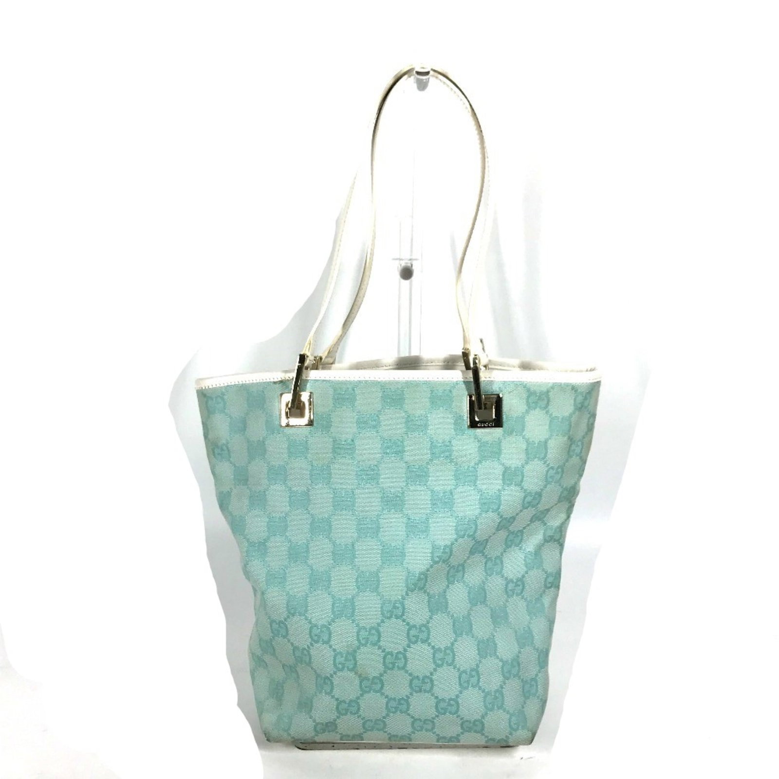 Tote Gucci Other: Tote Gucci Other Blue Gucci Other Tote Bag. This tote bag features a blue color and measures 17cm x 24cm x 10cm (6.7" x 9.4" x 3.9"). The bag's dimensions are indicated by the base measurement width o