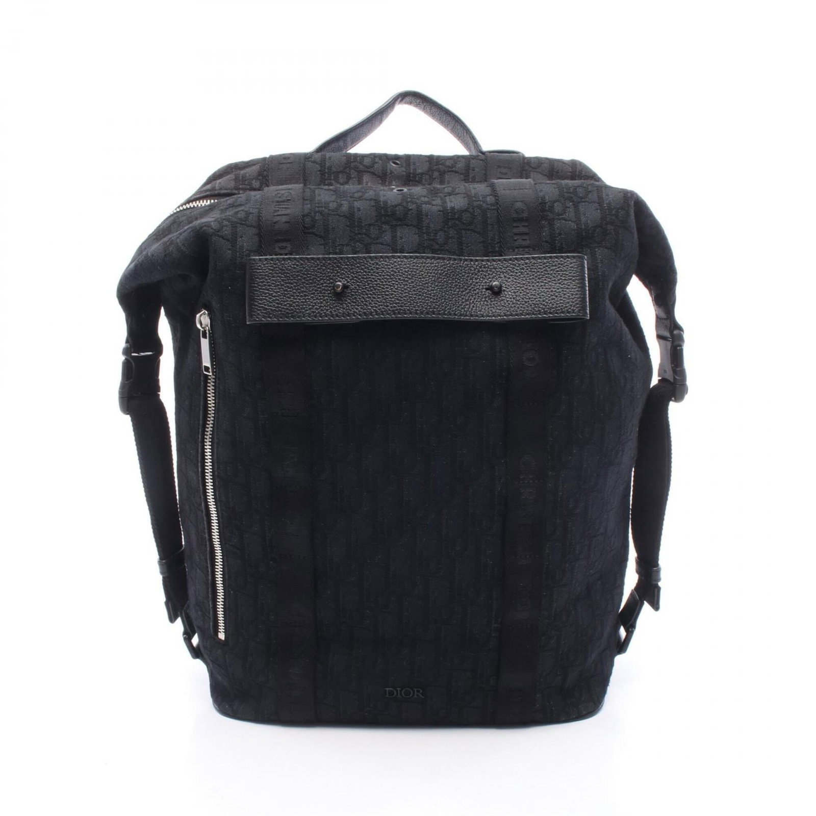 Canvas leather backpack handbag by Christian Dior: Canvas leather backpack handbag by Christian Dior Canvas leather backpack handbag by Christian Dior, featuring canvas and leather construction in black. This stylish backpack measures 39cm x 29cm x