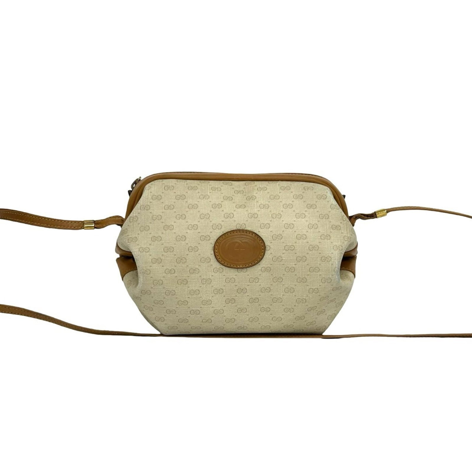 PVC leather bag shoulder pochette Gucci: PVC leather bag shoulder pochette Gucci This Gucci pochette shoulder bag features high-quality leather and PVC materials in beige and brown colors. With its classic design and compact size, it's