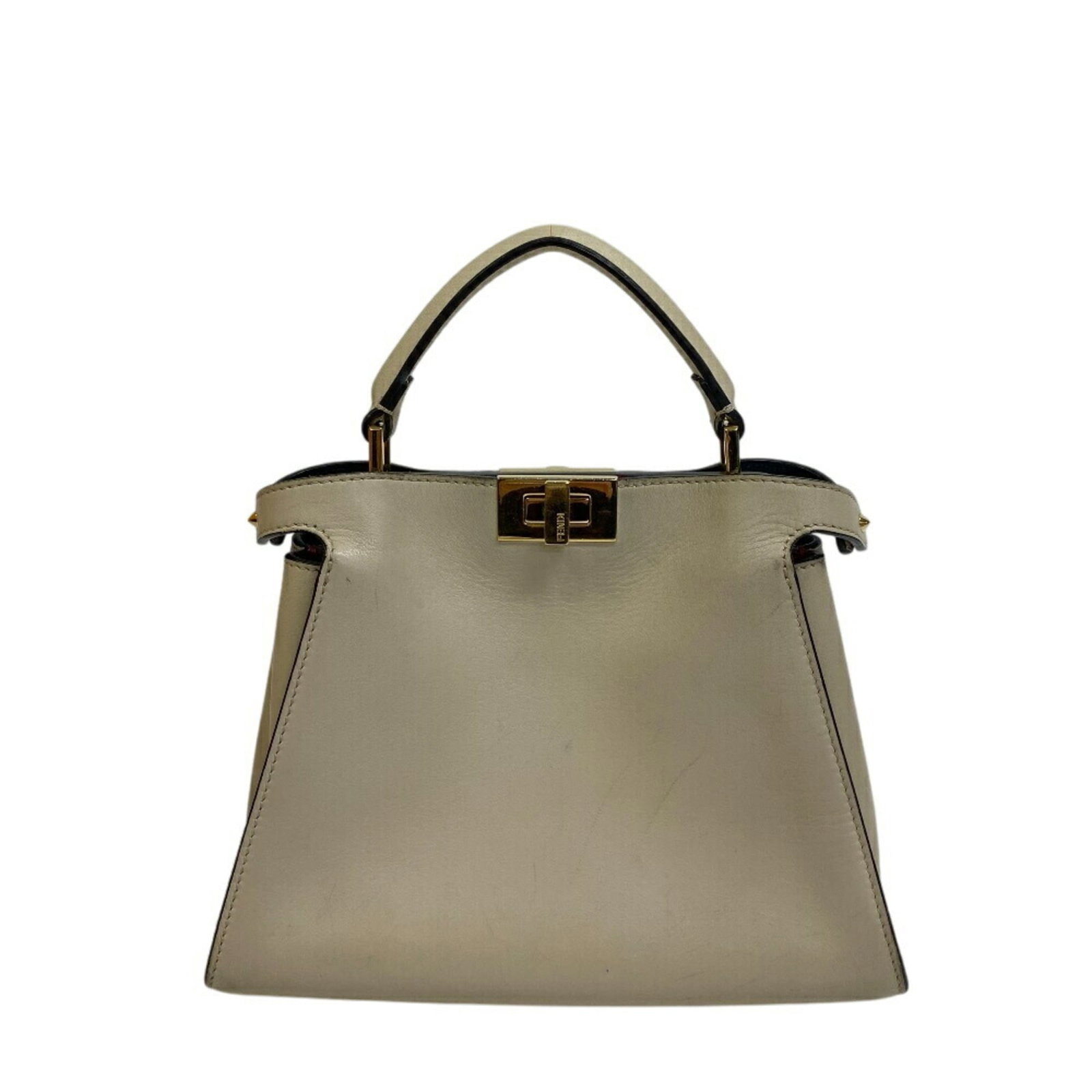 Handbag Leather Shoulder Bag Fendi: Handbag Leather Shoulder Bag Fendi The Fendi Handbag Leather Shoulder Bag boasts a classic design with a timeless beige color. Made from high-quality leather, its elegant shape and sophisticated style