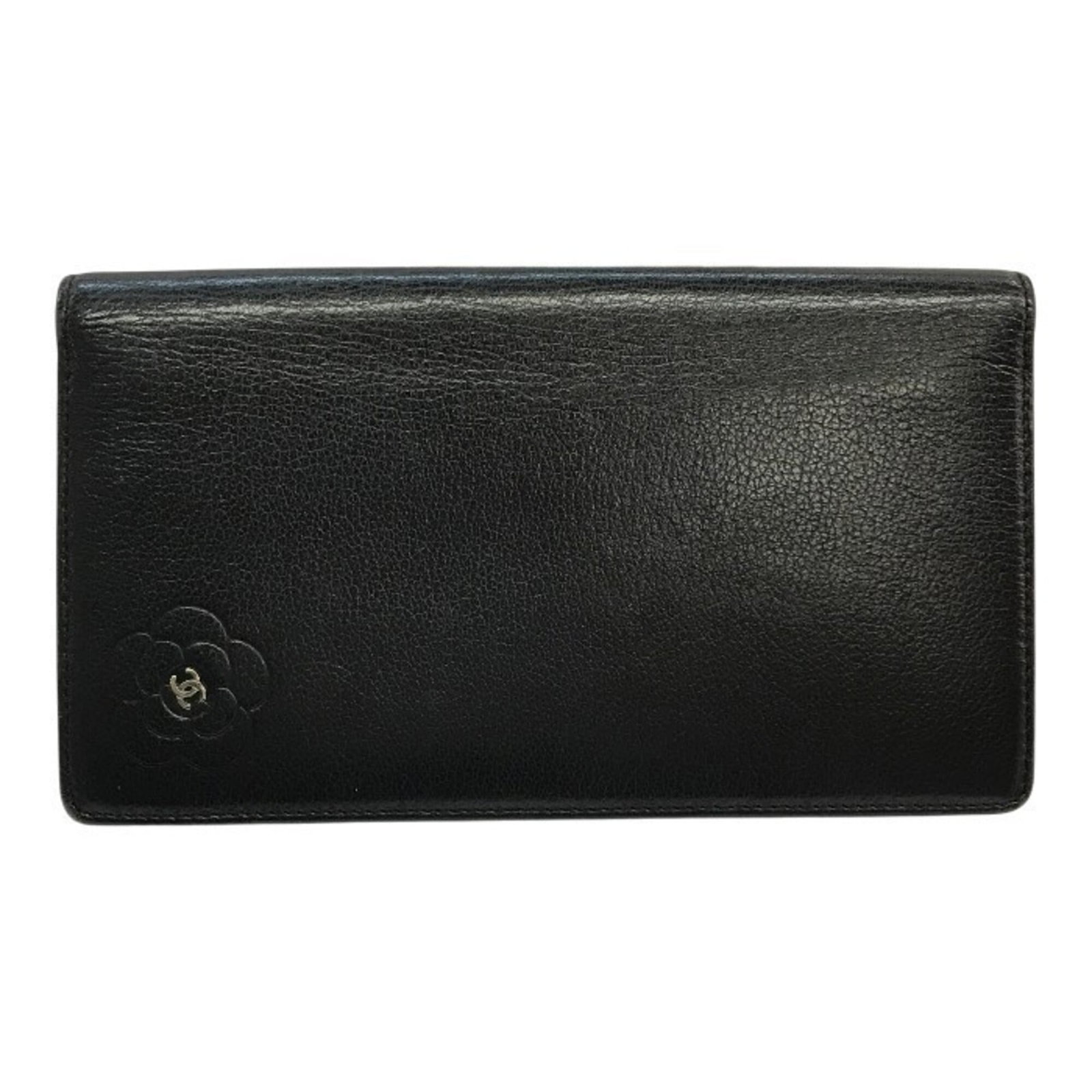 Chanel Long Wallet (Bi-Fold) Leather: Chanel Long Wallet (Bi-Fold) Leather Black leather bi-fold wallet from Chanel, measuring 10.5cm x 18.5cm x 2cm, featuring the iconic Camellia design and crafted in France. This long wallet showcases