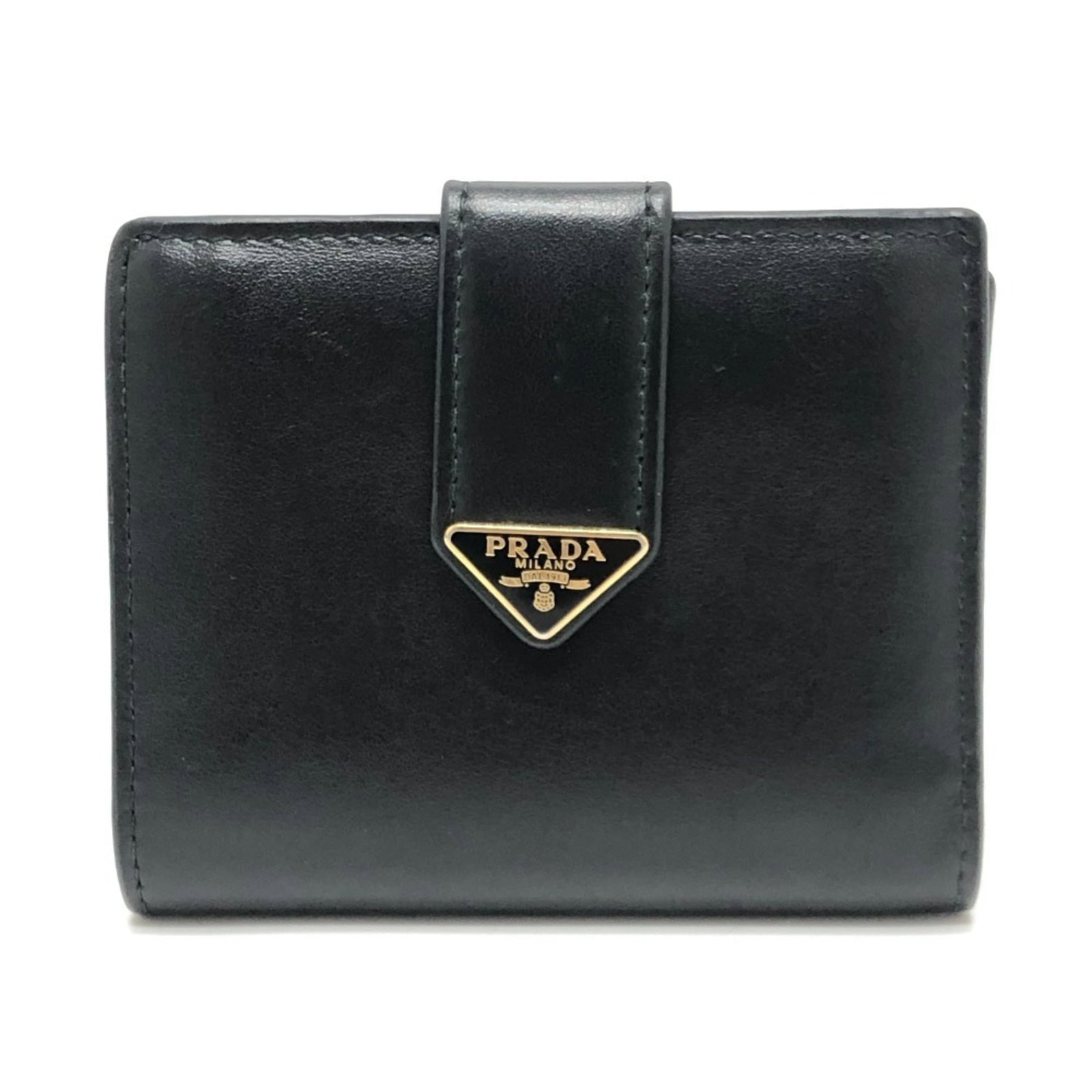 Prada Wallet (Bi-Fold) Leather: Prada Wallet (Bi-Fold) Leather The Prada Country bi-fold leather wallet features a sleek black design with a button closure and snap fastener. Made from high-quality Italian leather, its compact size