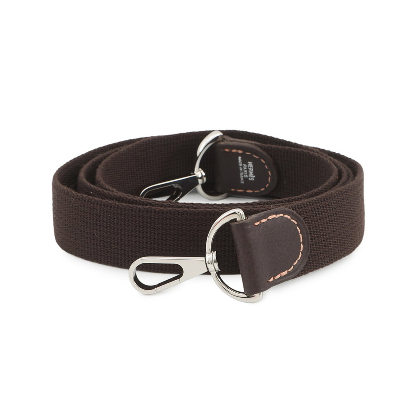 Hermes Leather Strap Canvas: Hermes Leather Strap Canvas Canvas and leather come together in a classic design, with brown color and a length of 111cm. This strap bears a signature, adding a touch of personal style to any outfit. 