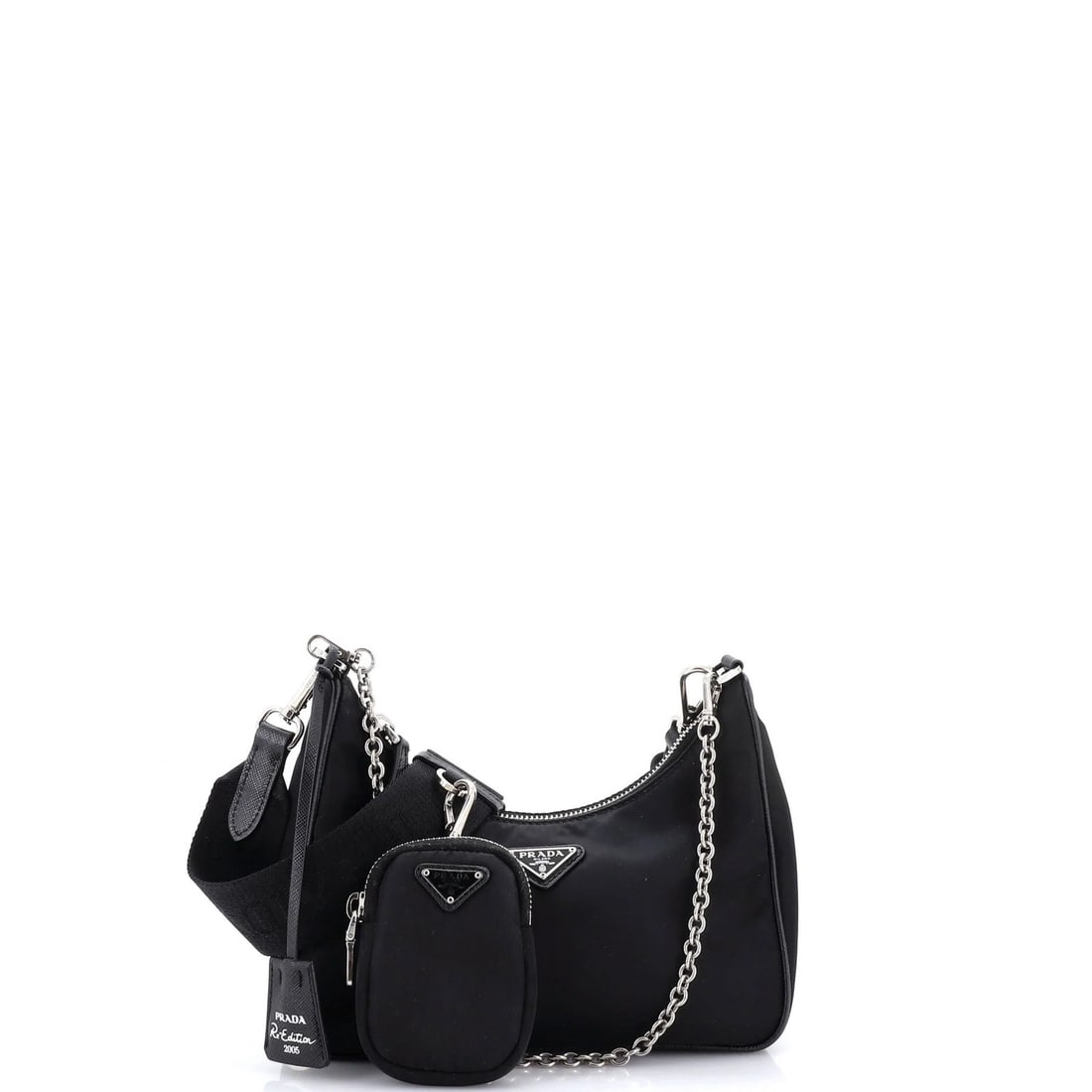 Small bag Tessuto shoulder Re-Edition Prada 2005: Small bag Tessuto shoulder Re-Edition Prada 2005 Small bag with Tessuto fabric, characteristic of Prada's iconic Re-Edition style from 2005. Measuring 5" high and 8.5" wide, it features a cross body d