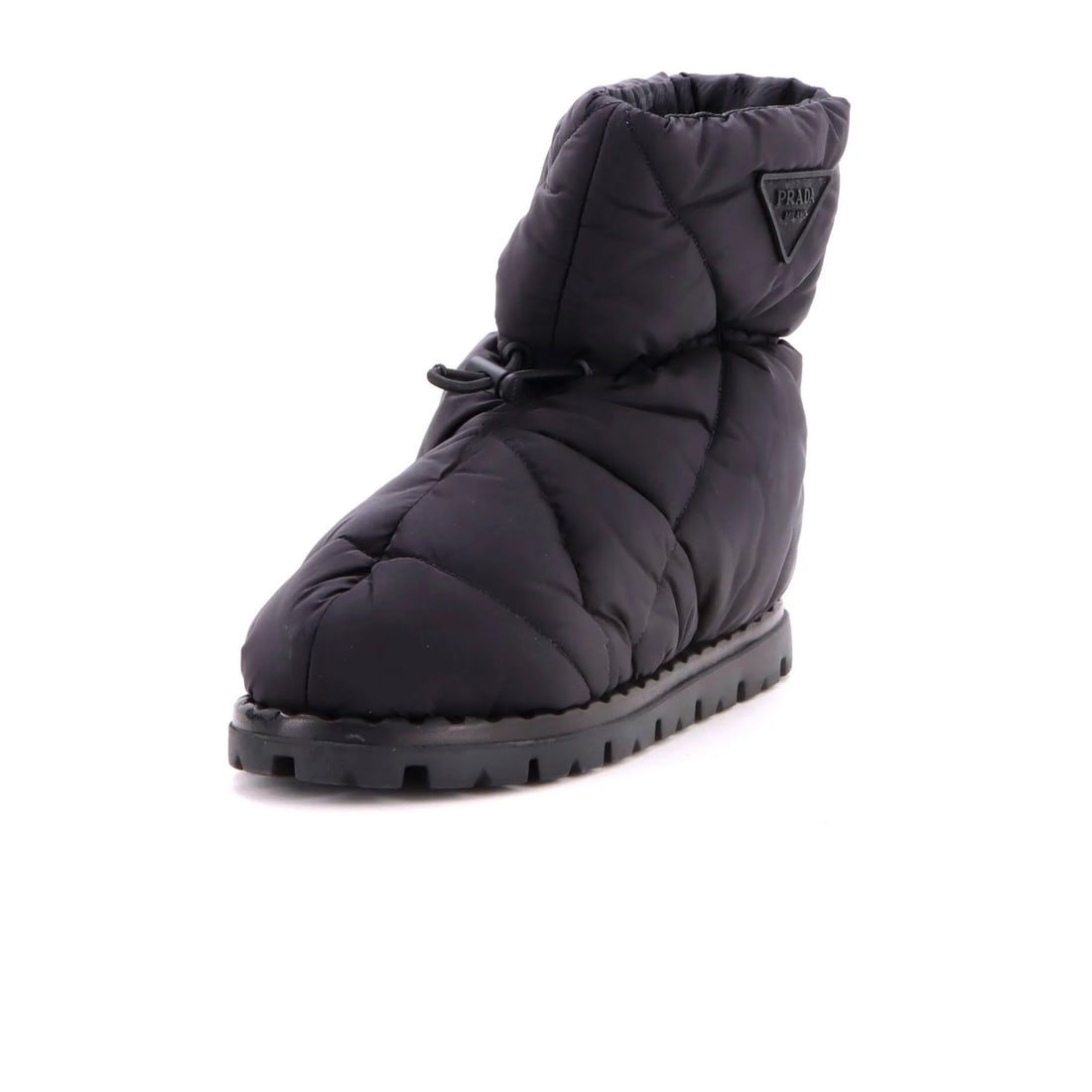 Women's padded quilted nylon snow boots by Prada: Women's padded quilted nylon snow boots by Prada Women's padded quilted nylon snow boots by Prada, featuring a black exterior and interior with minor scuffs throughout. The boots boast a quilted nylon
