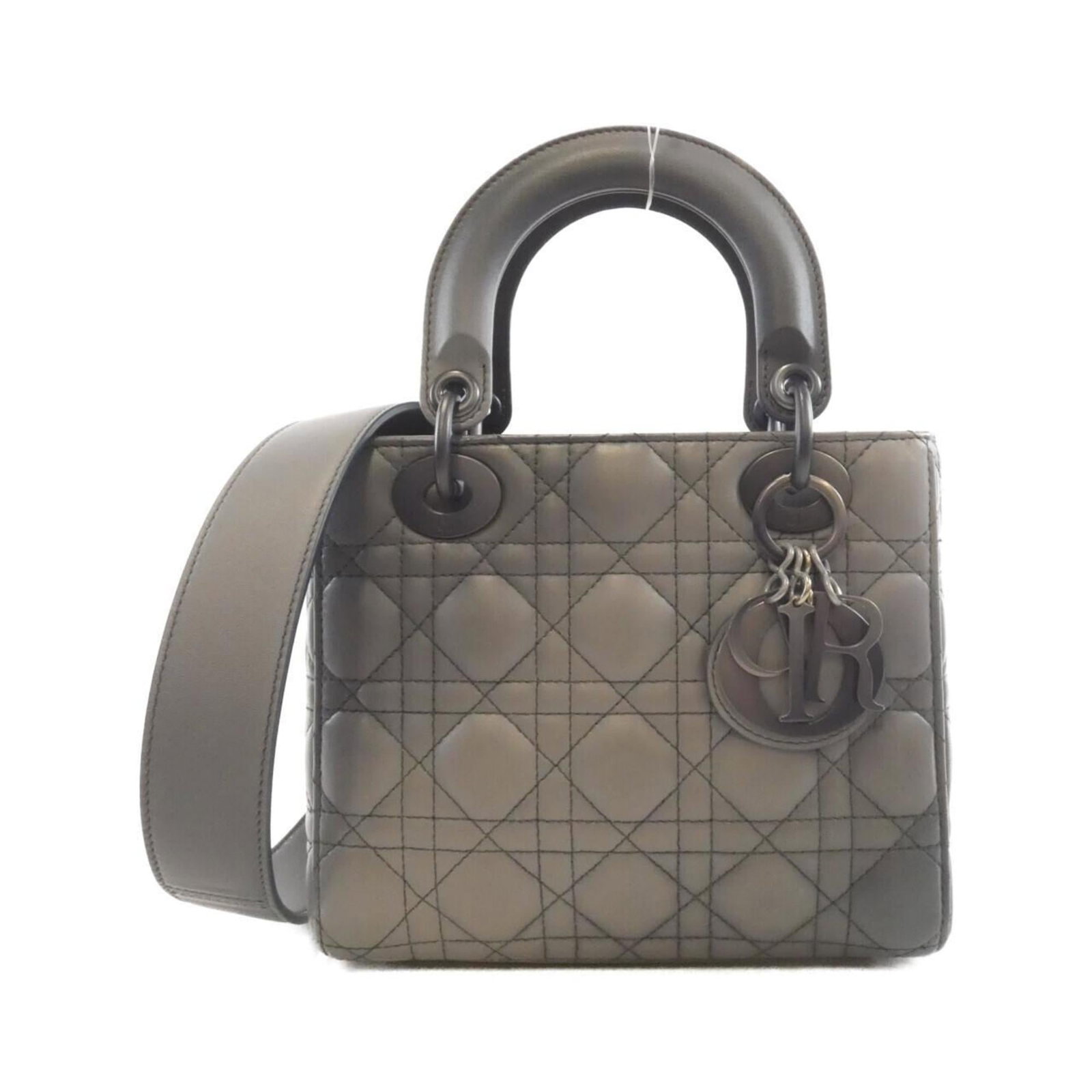 Handbag Christian Dior Leather: Handbag Christian Dior Leather Handbag from Christian Dior's Lady Dior line, crafted with high-quality leather in a sleek gray and silver color scheme. Measuring 17cm x 20cm x 8cm, this stylish bag