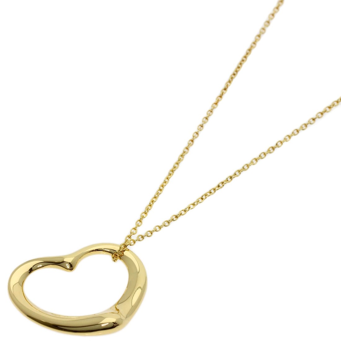 Yellow Gold Tiffany Necklace K18 Open Heart: Yellow Gold Tiffany Necklace K18 Open Heart K18 Yellow Gold Tiffany Necklace Open Heart features a sleek, gold metal design with no main stone. The necklace measures 15.7 inches in length and boasts