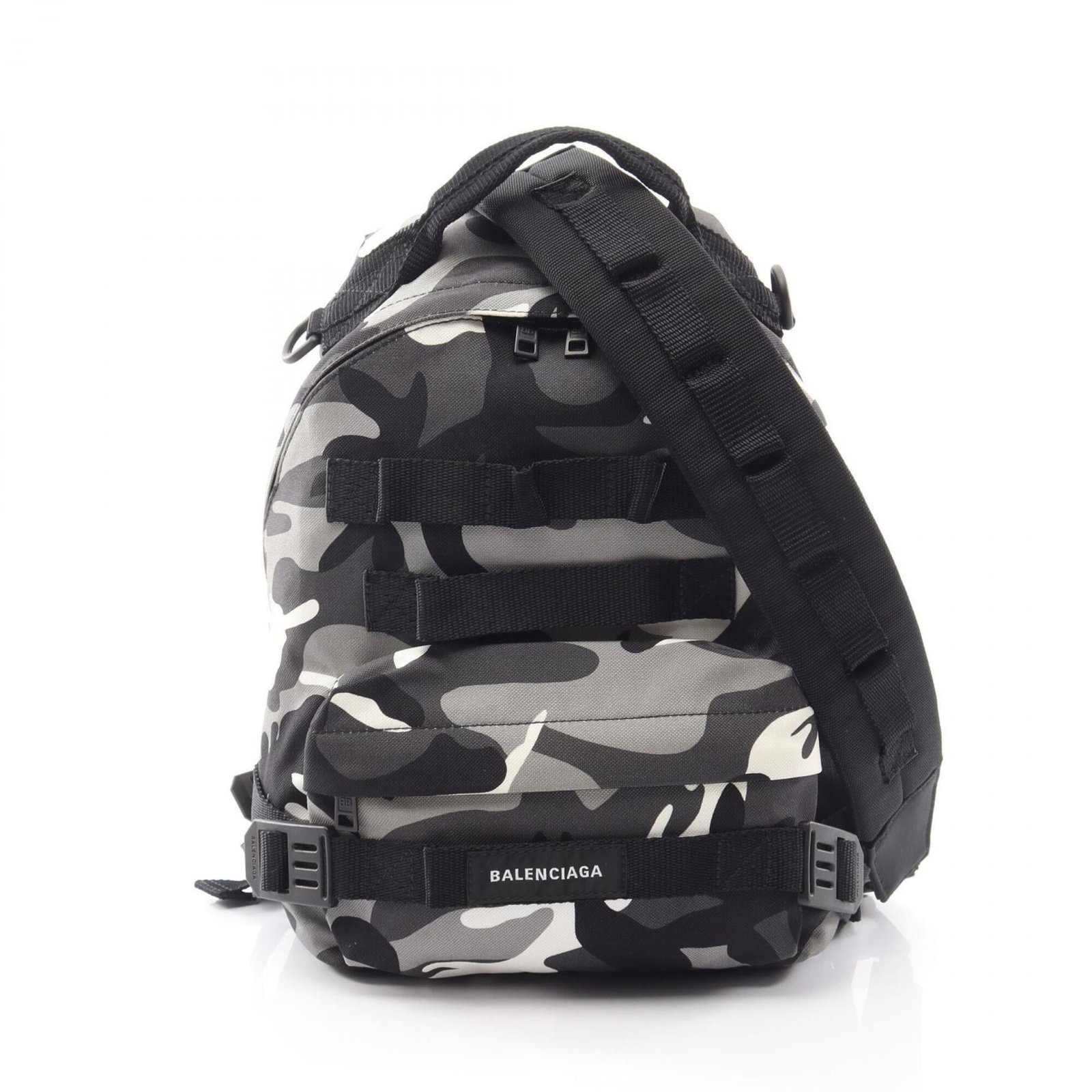 Canvas backpack handbag by Balenciaga: Canvas backpack handbag by Balenciaga Canvas backpack handbag by Balenciaga, available in black, gray, and white. This canvas backpack features a classic design with clean lines and a timeless aesthet