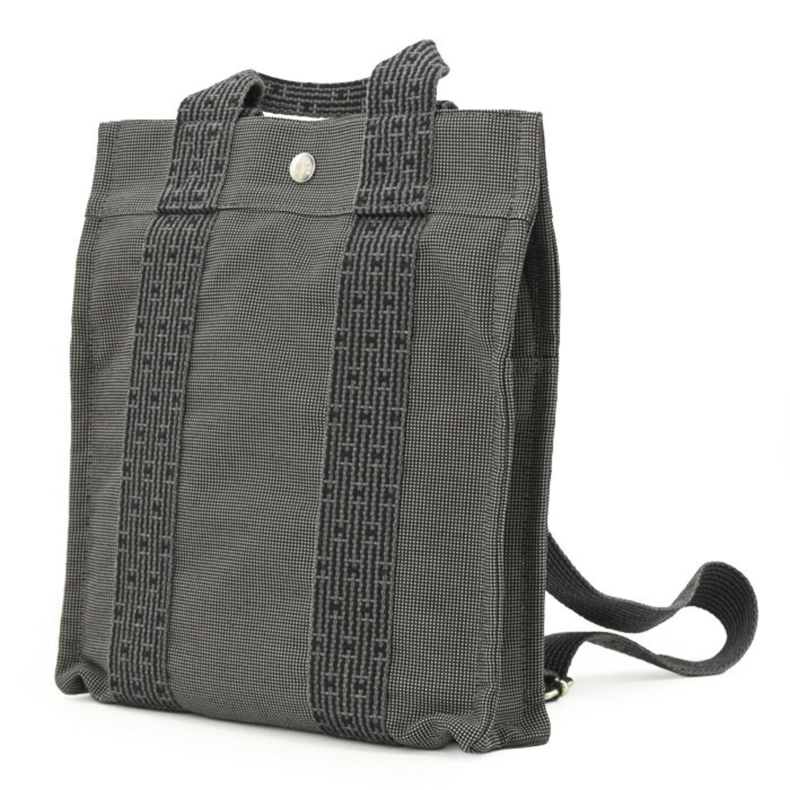 Canvas tote bag by Hermes backpack: Canvas tote bag by Hermes backpack Canvas tote bag by Hermes backpack features a sturdy canvas material and a compact size, making it perfect for everyday use. The gray color provides a versatile and 