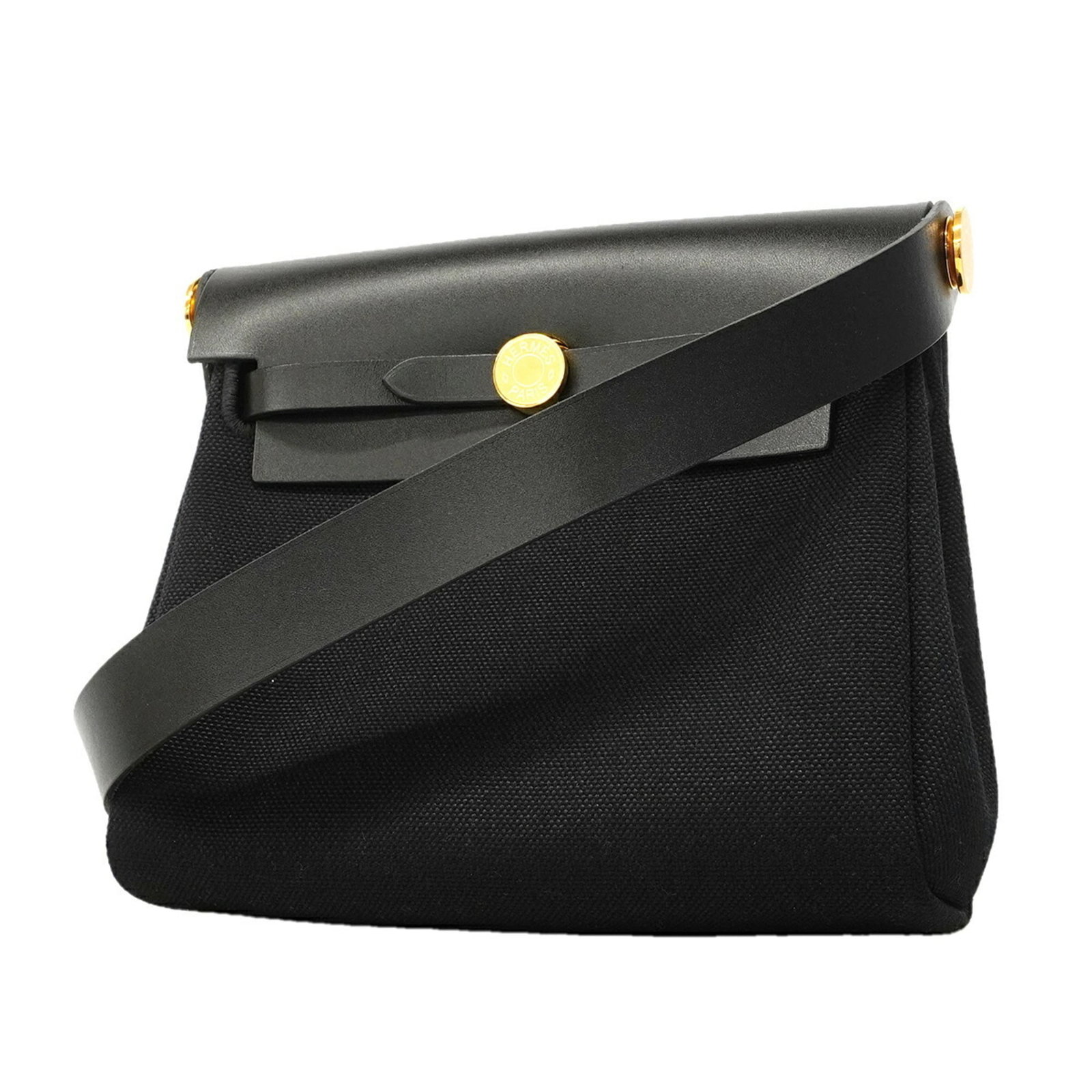 Shoulder Bag Hermes Toile Officier: Shoulder Bag Hermes Toile Officier Toile Officier shoulder bag from Hermes, crafted with Toile officier material in black. The gold hardware adds a touch of elegance to this classic design. Measuring 