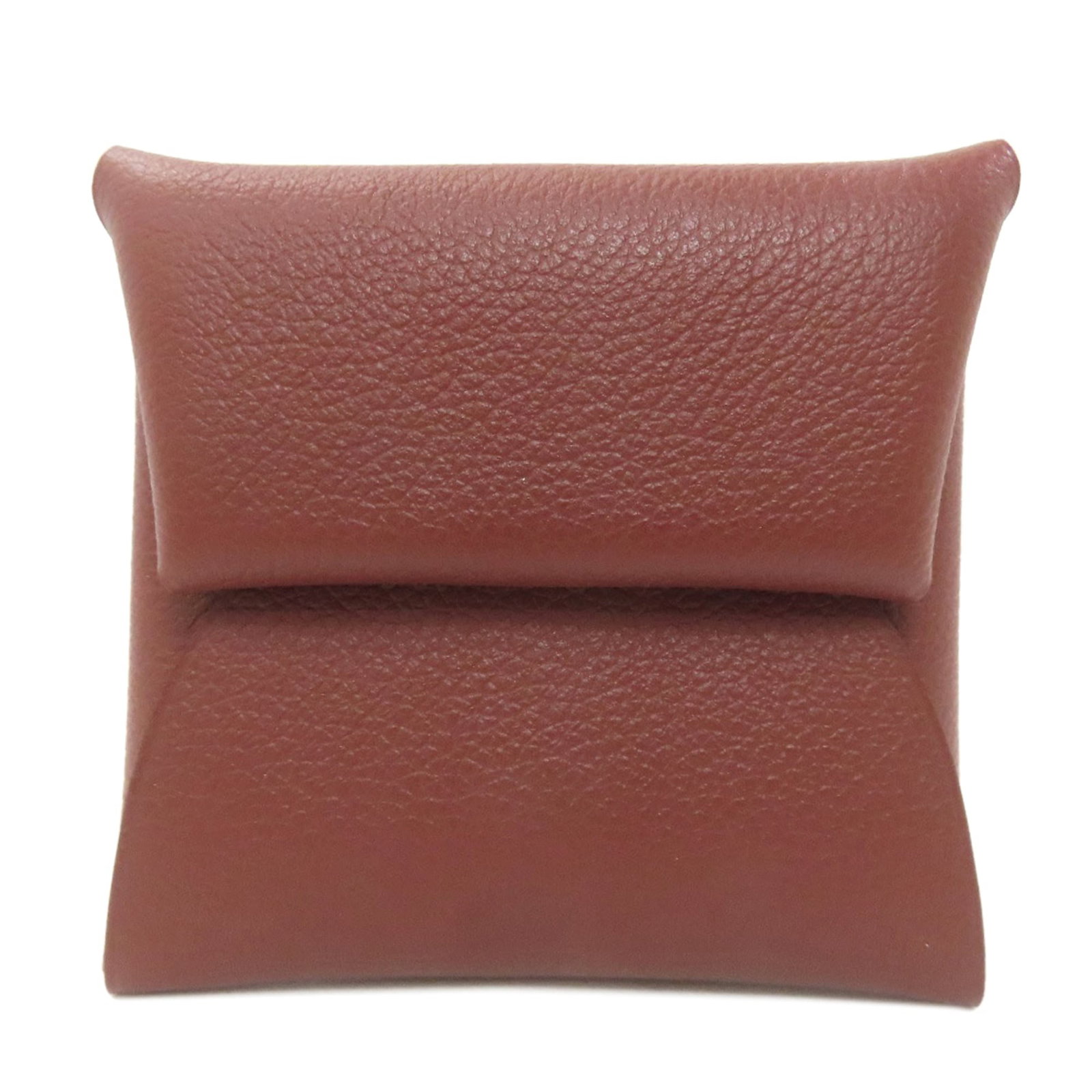 Coin purse by Hermes: Coin purse by Hermes Red coin purse by Hermes, measuring 8cm x 8.5cm x 1cm in size, features the iconic brand's signature style and design. This compact case is crafted with attention to detail and bo