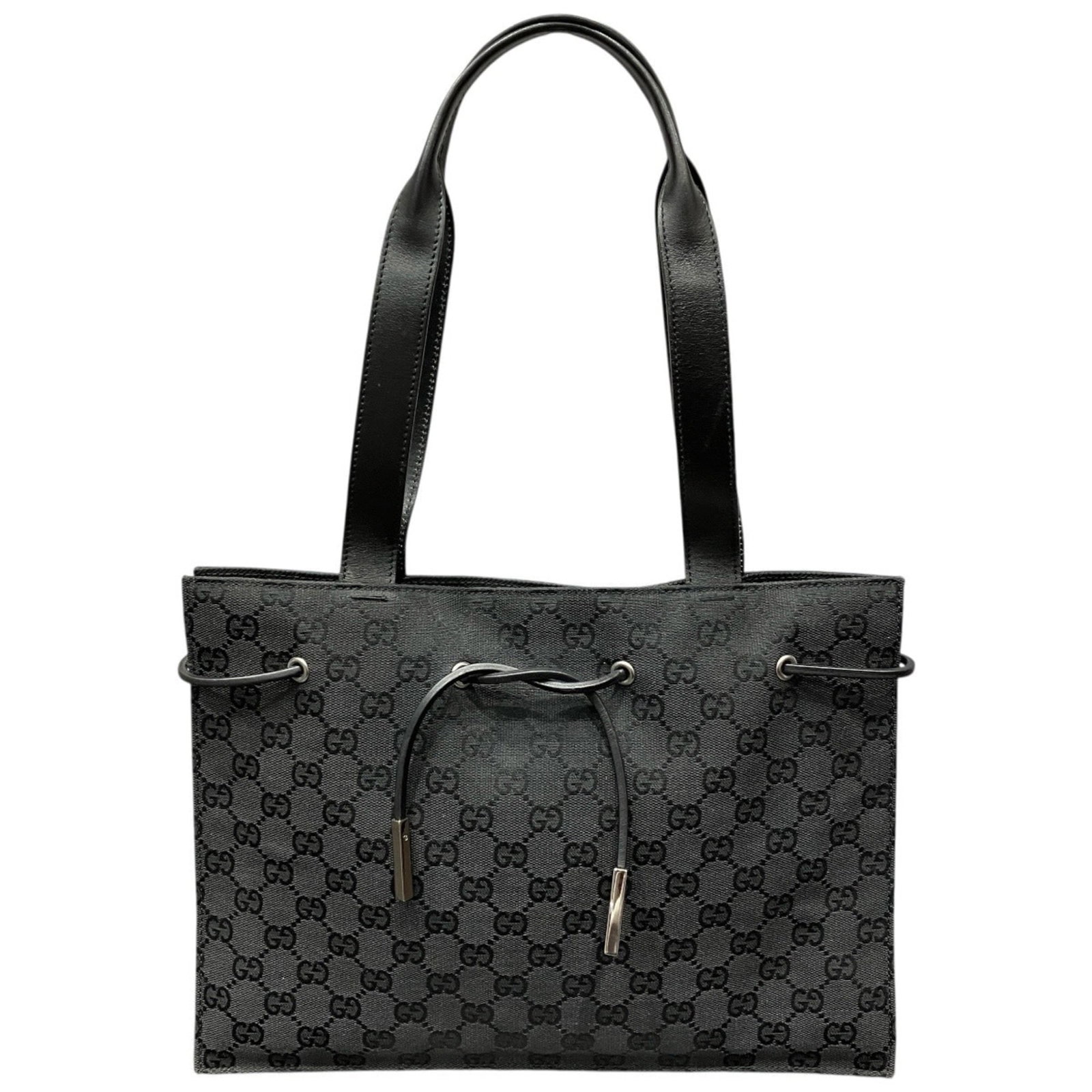 Gucci Tote Bag Canvas: Gucci Tote Bag Canvas Canvas tote bag from Gucci, featuring a sleek black design with a signature. Made from high-quality canvas material, this tote measures 23.5cm x 32.5cm x 8cm and is perfect for