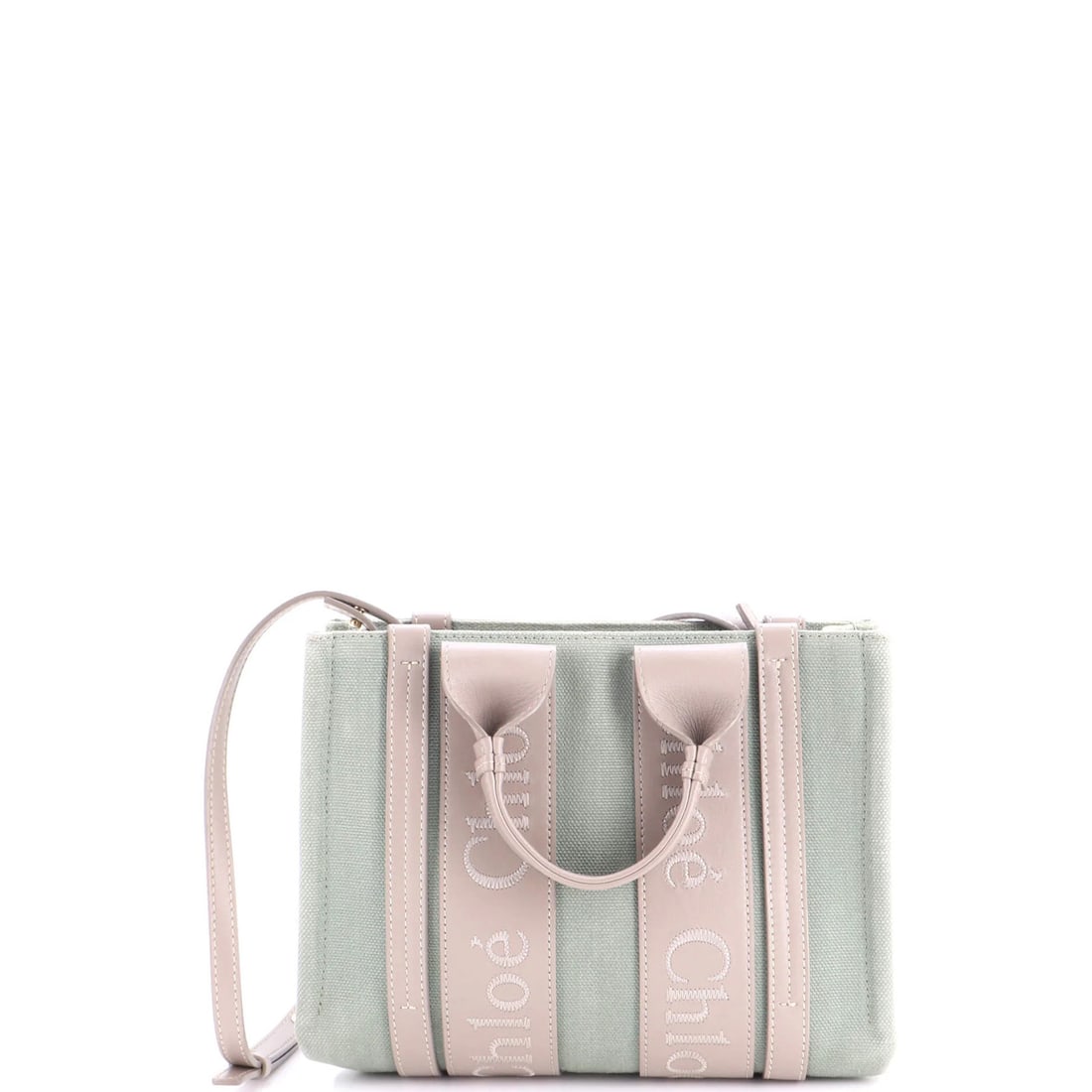 Chloe Woody Convertible Tote Linen and Leather Small: Chloe Woody Convertible Tote Linen and Leather Small Chloe's Woody Convertible Tote boasts a unique blend of leather and linen, offering a stylish and versatile design. With its small size and