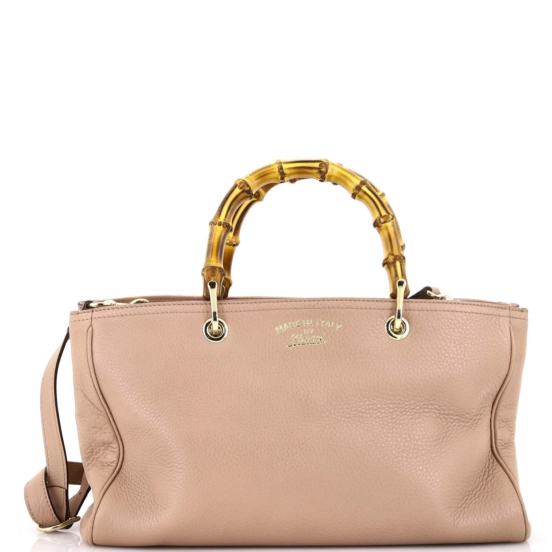Gucci leather tote shopper bamboo medium: Gucci leather tote shopper bamboo medium Pink Gucci leather tote shopper with bamboo accents, featuring a medium size and gold-tone hardware. The exterior shows signs of wear, including heavy corner w