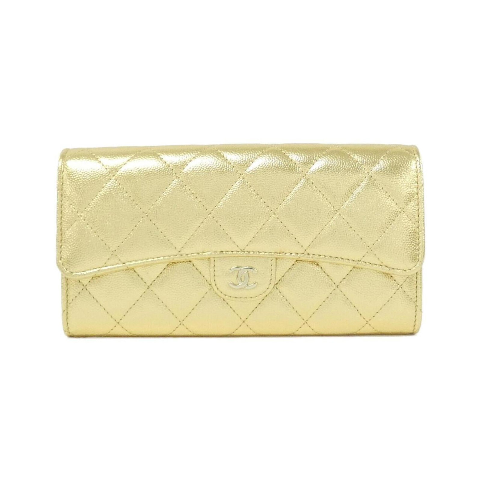 Calfskin long bi-fold wallet from Chanel: Calfskin long bi-fold wallet from Chanel Grained Calfskin Long Bi-Fold Wallet from Chanel. This elegant wallet features gold tone and measures 10cm x 19.5cm x 2cm, making it a stylish accessory for ev