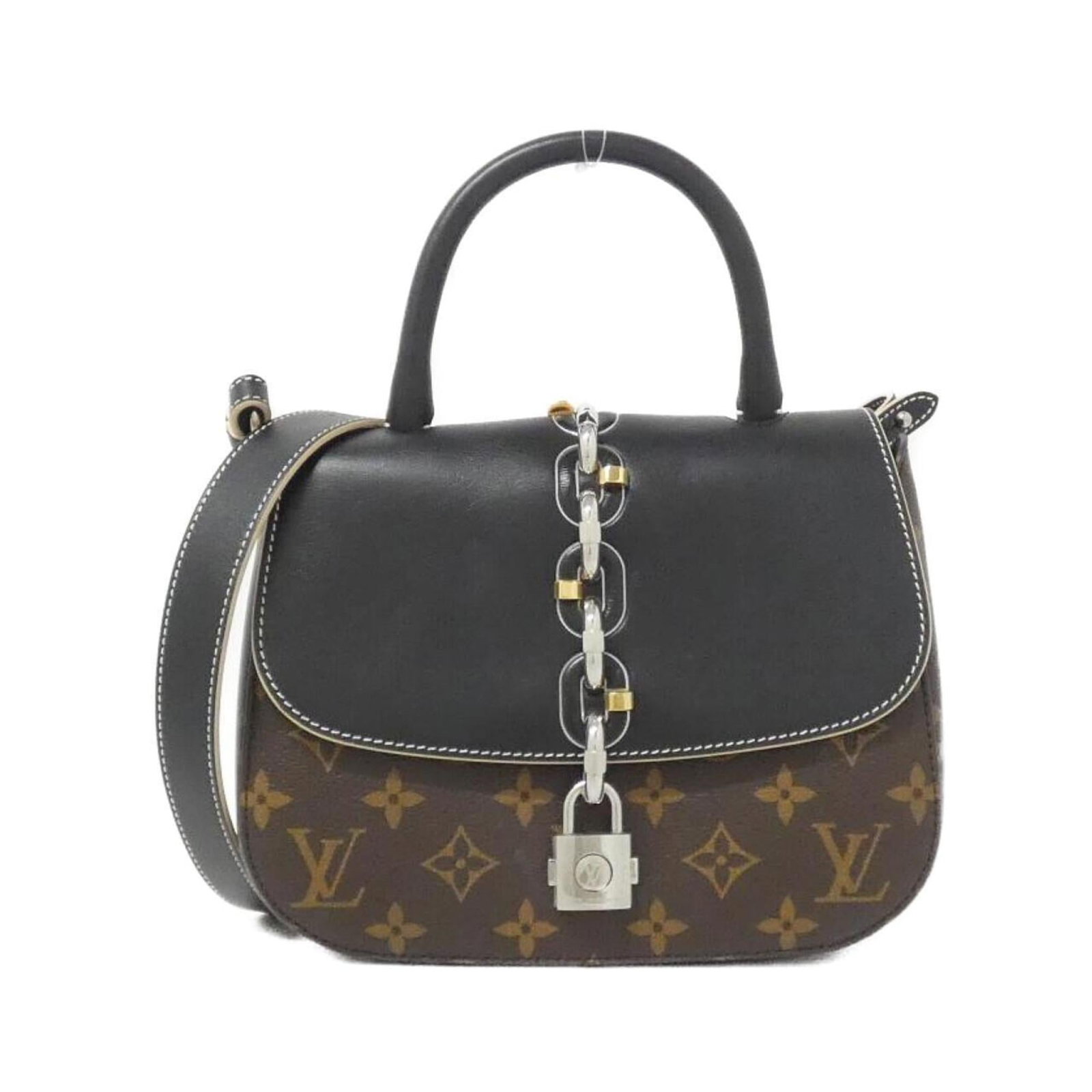 Canvas Leather Coated Handbag Vuitton Louis: Canvas Leather Coated Handbag Vuitton Louis Canvas Leather Coated Handbag Vuitton Louis bears a signature. Made from coated canvas and calfskin leather, this black handbag features a shoulder strap
