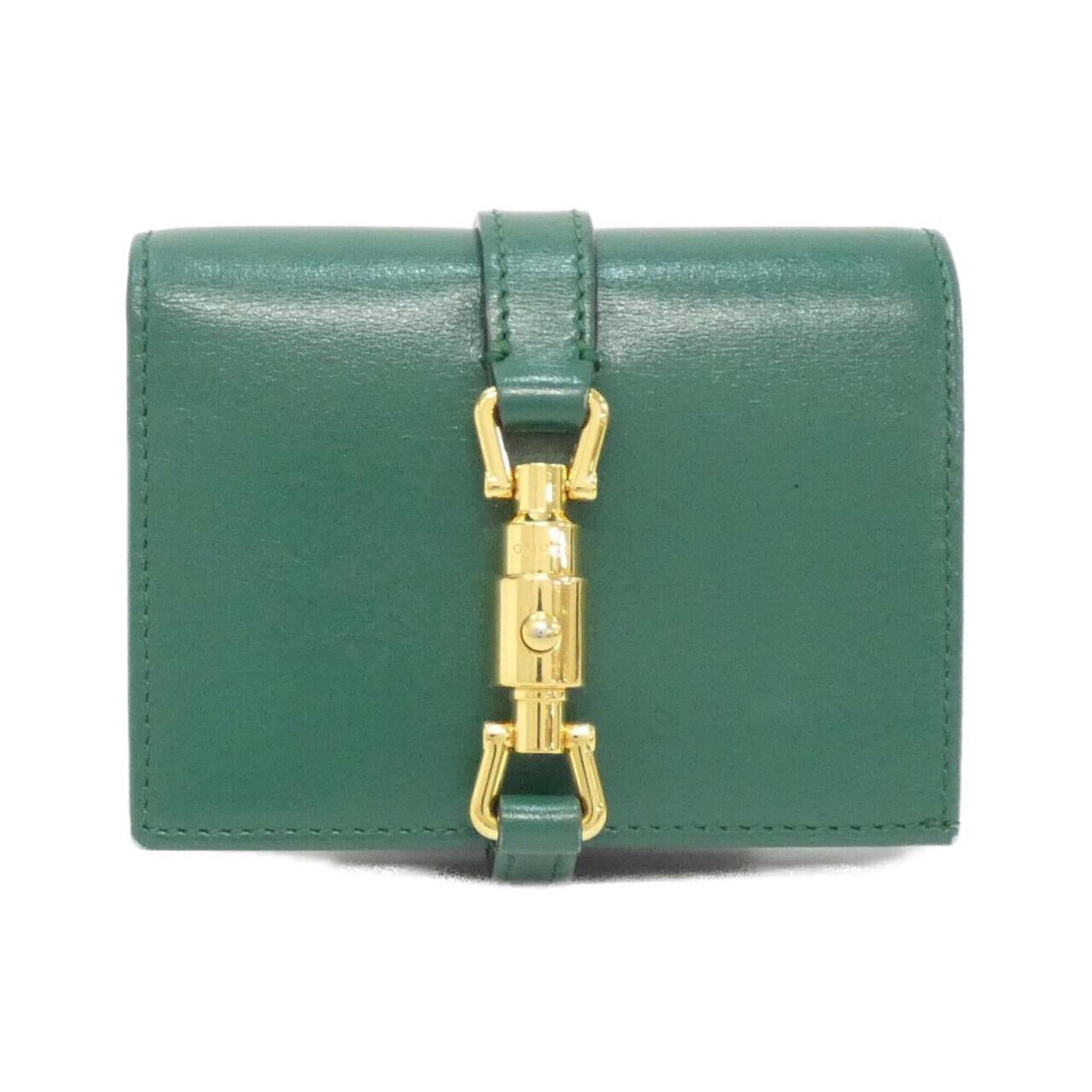 Gucci Wallet (Bi-Fold) Leather: Gucci Wallet (Bi-Fold) Leather Gucci's bi-fold leather wallet boasts an eye-catching emerald green hue, adding a pop of color to any outfit. Made from high-quality leather, its sleek design and compac