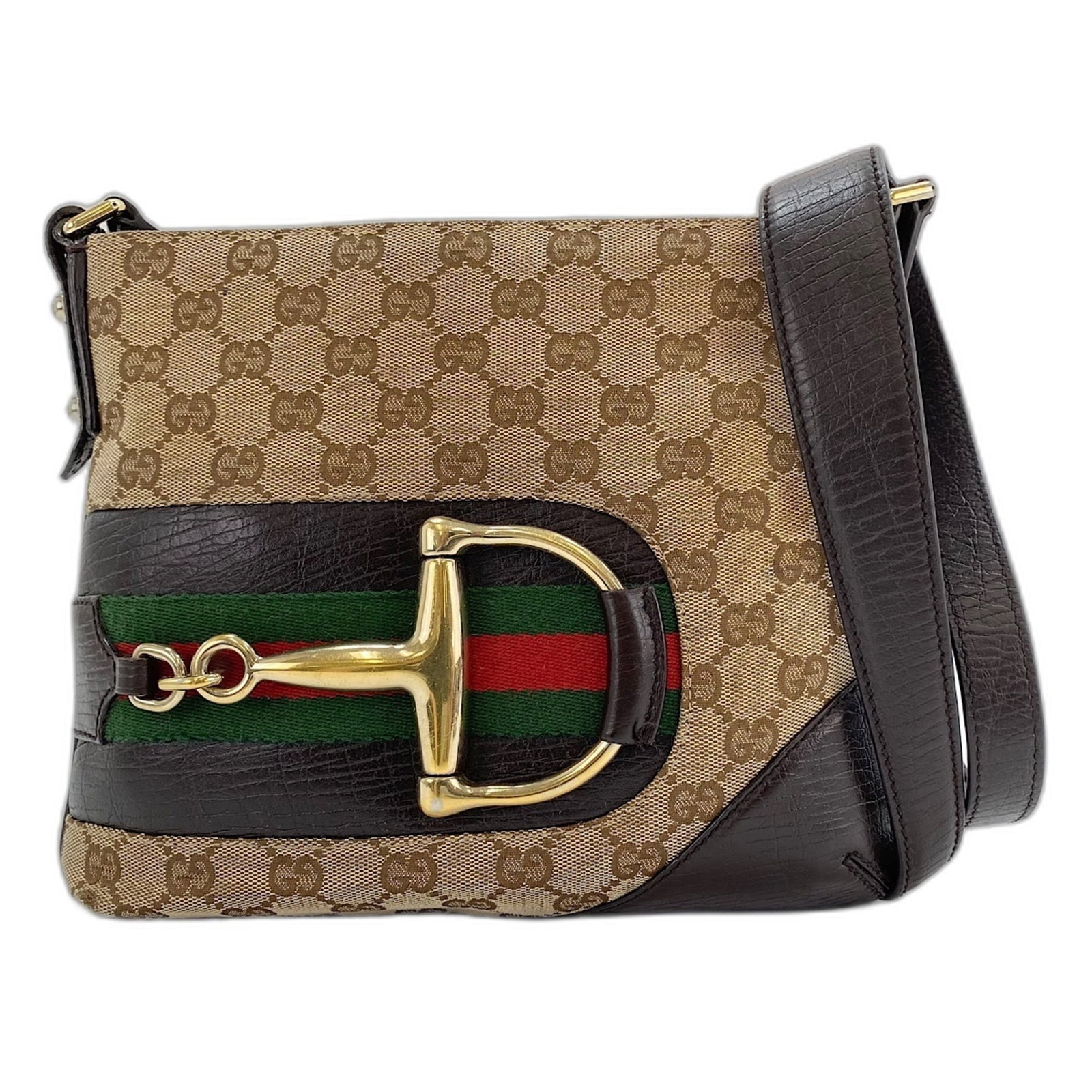 Shoulder Bag Gucci: Shoulder Bag Gucci The Gucci Horsebit shoulder bag boasts its signature iconic design, featuring a timeless beige color and classic horsebit detailing. Measuring 21cm x 27cm x 3cm, it's the perfect si