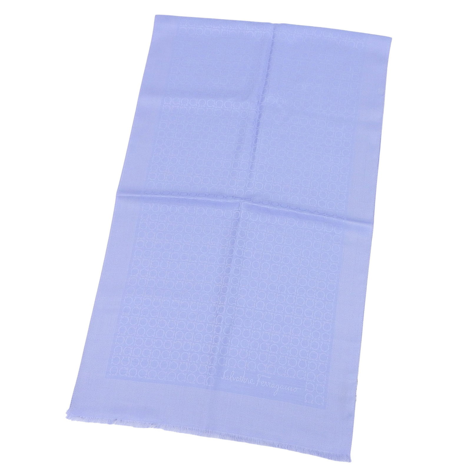 Salvatore Ferragamo Stole Silk Wool: Salvatore Ferragamo Stole Silk Wool Silk and wool blend in a stunning light blue stole from Salvatore Ferragamo, Italy's renowned fashion house. Measuring 1.58m x 47cm, this elegant piece boasts the s