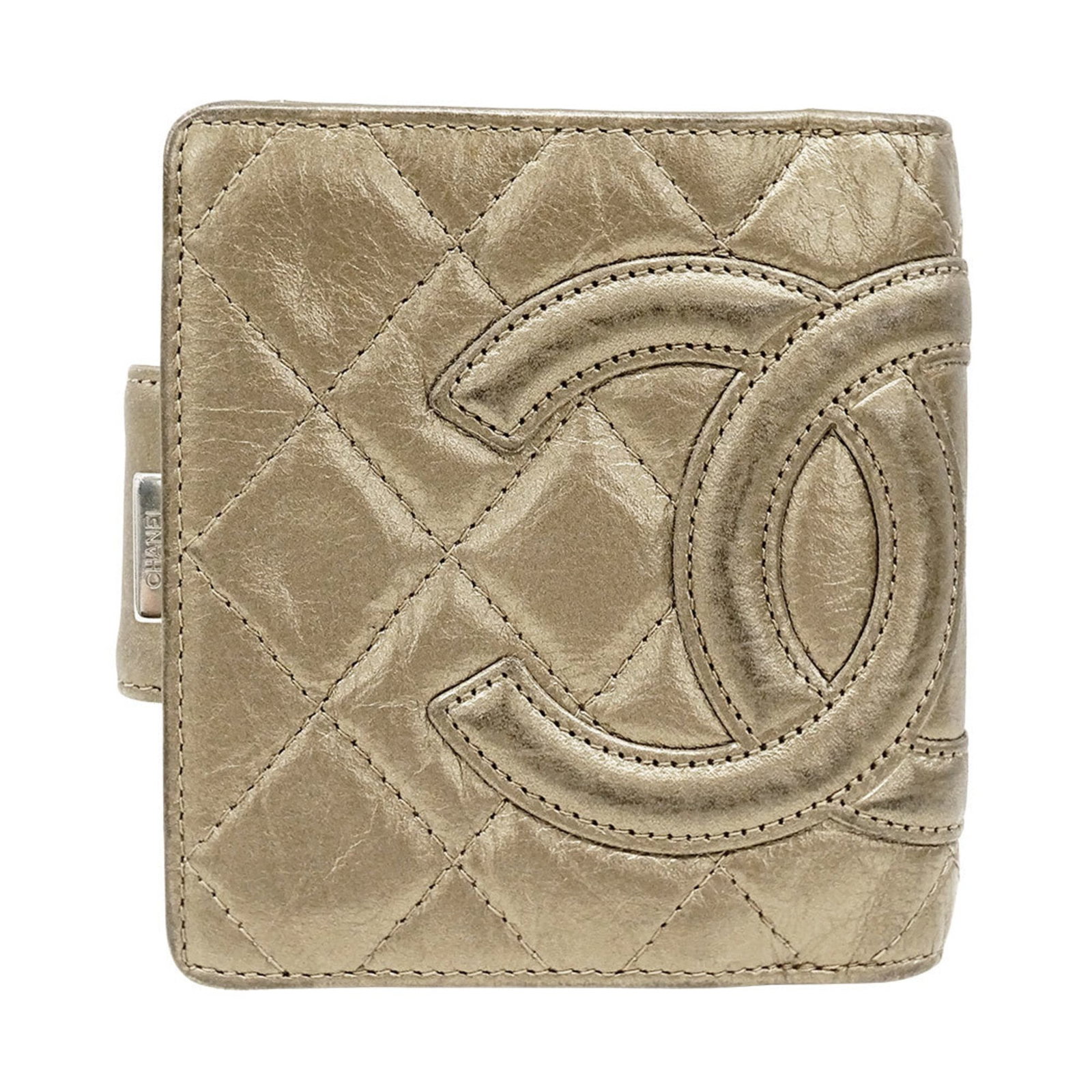 Chanel Wallet (Bi-Fold) Leather: Chanel Wallet (Bi-Fold) Leather The Chanel Wallet (Bi-Fold) Leather is a classic, gold leather bi-fold wallet from the renowned French fashion house. Measuring 10.5cm x 9cm x 2cm, it features